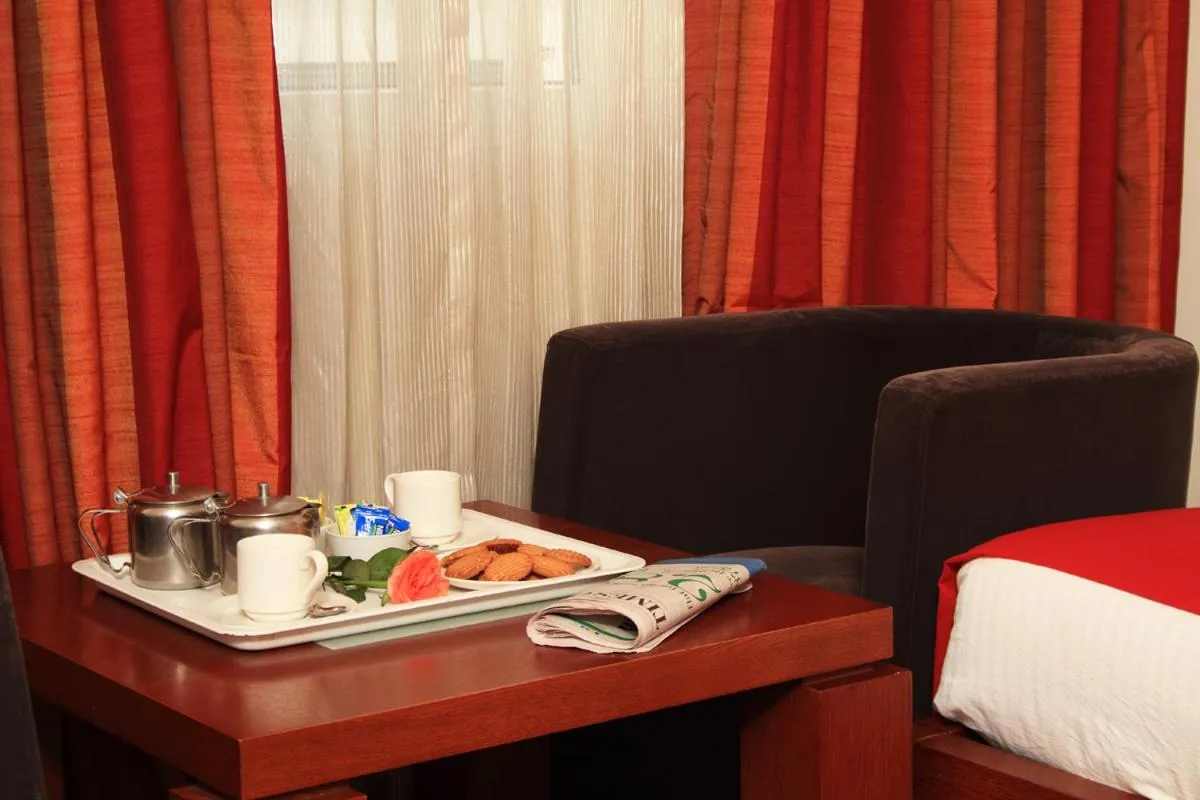 Coffee/tea facilities, Bed in Parijatha Gateway