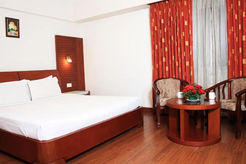 Photo of the whole room, Bed in Parijatha Gateway