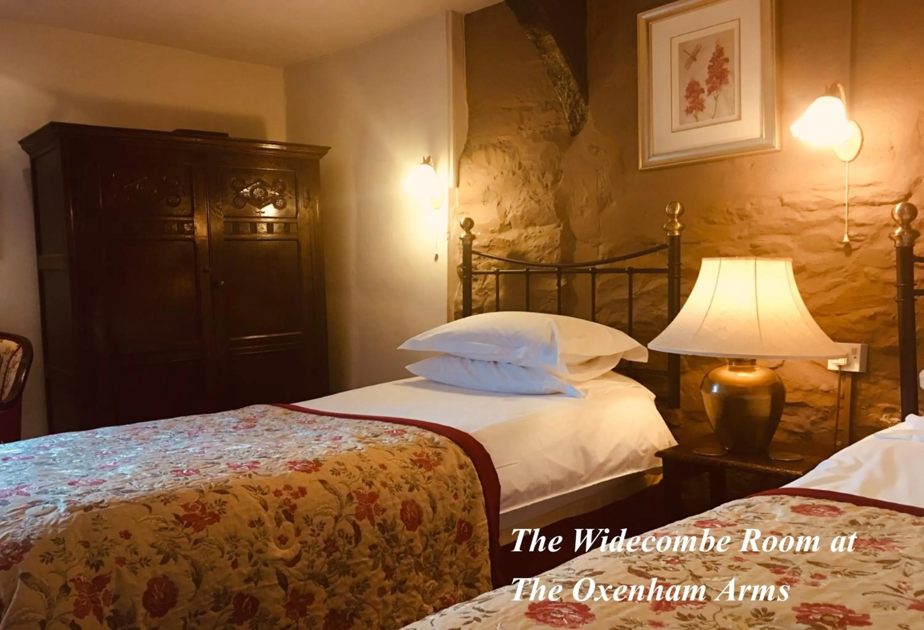 Bed in The Oxenham Arms Hotel Devon