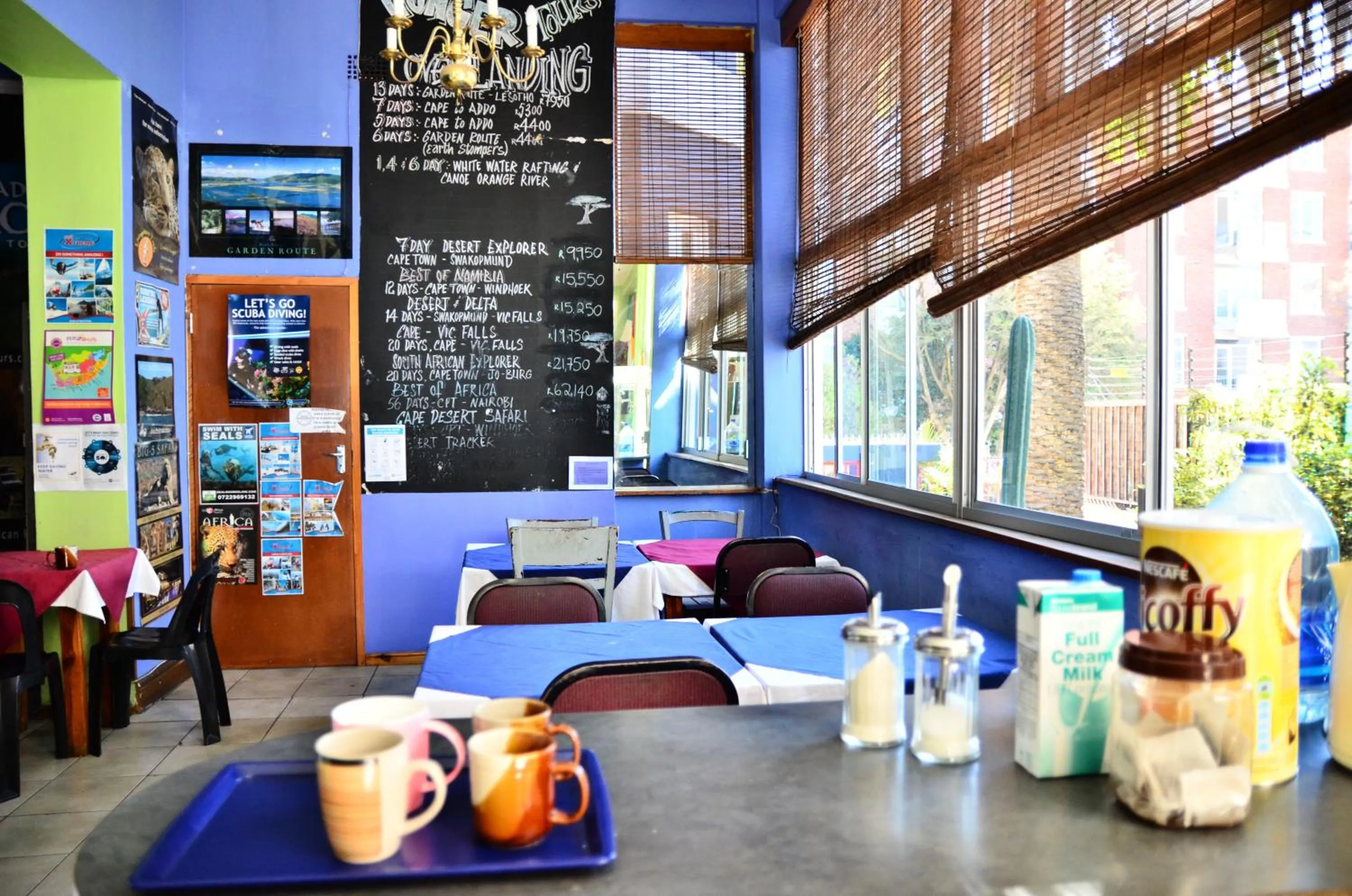 Communal lounge/ TV room in Big Blue Backpackers