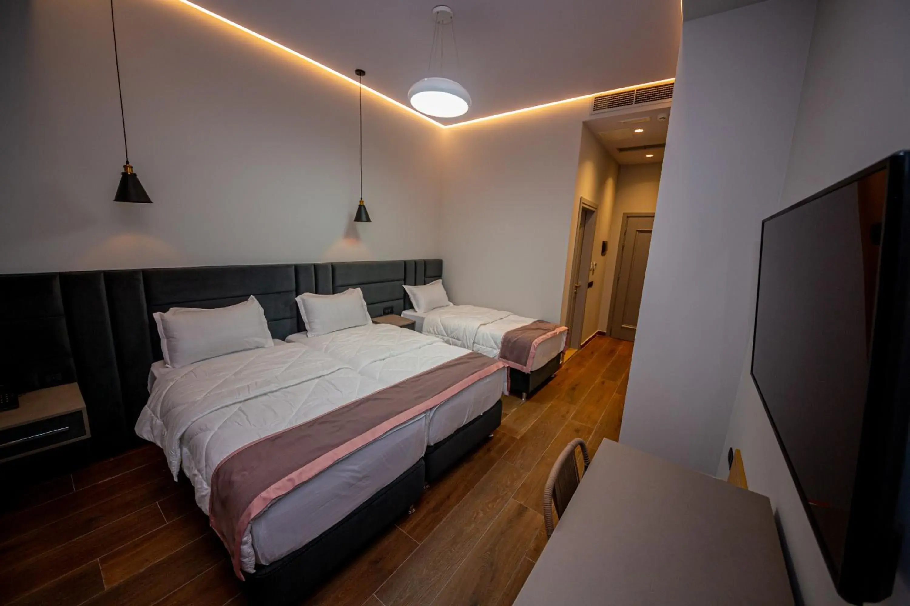 Economy Triple Room - Ground Floor in City Center Hotel Economy Triple Room - Ground Floor in City Center Hotel