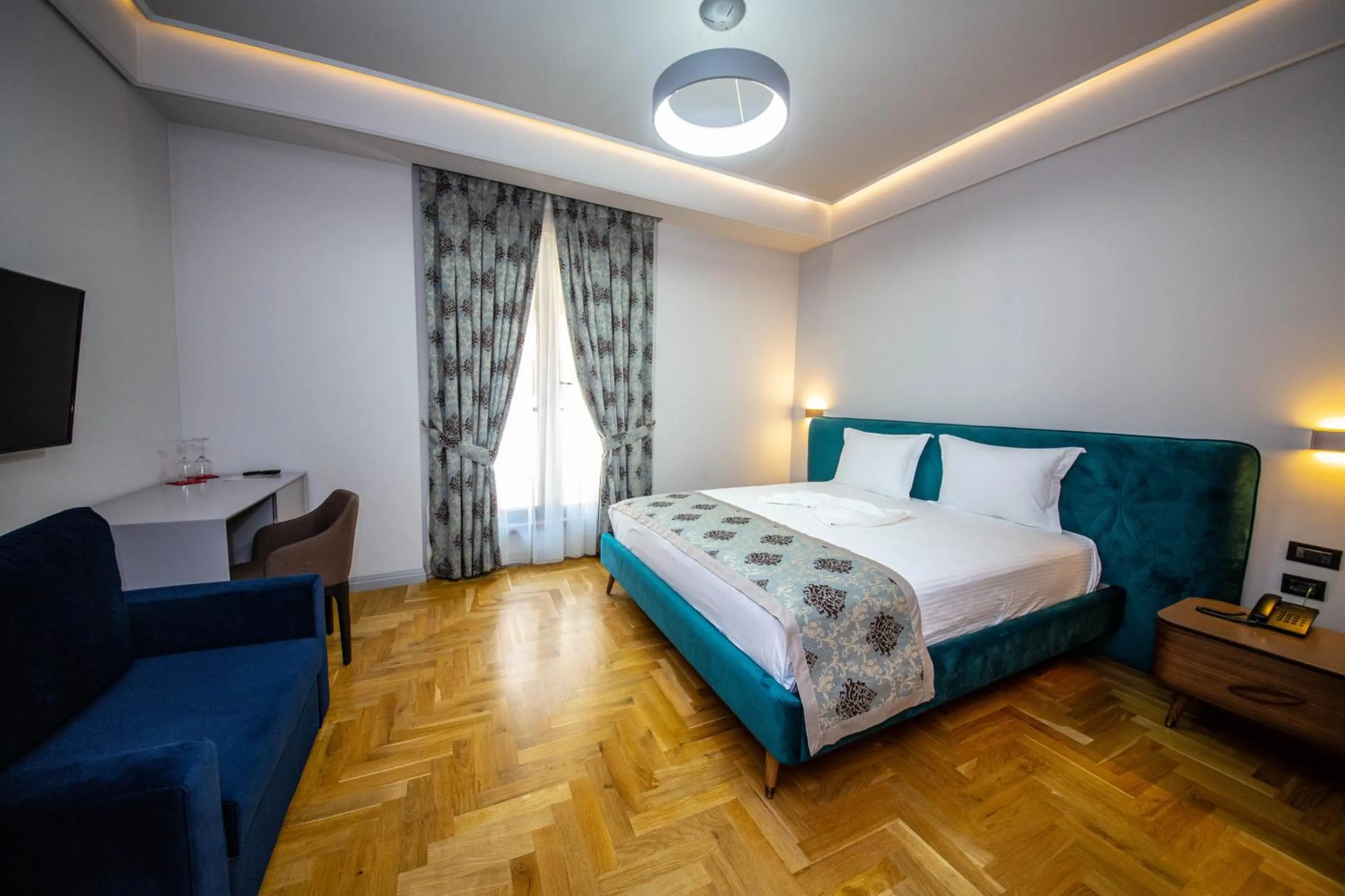 Photo of the whole room, Bed in City Center Hotel