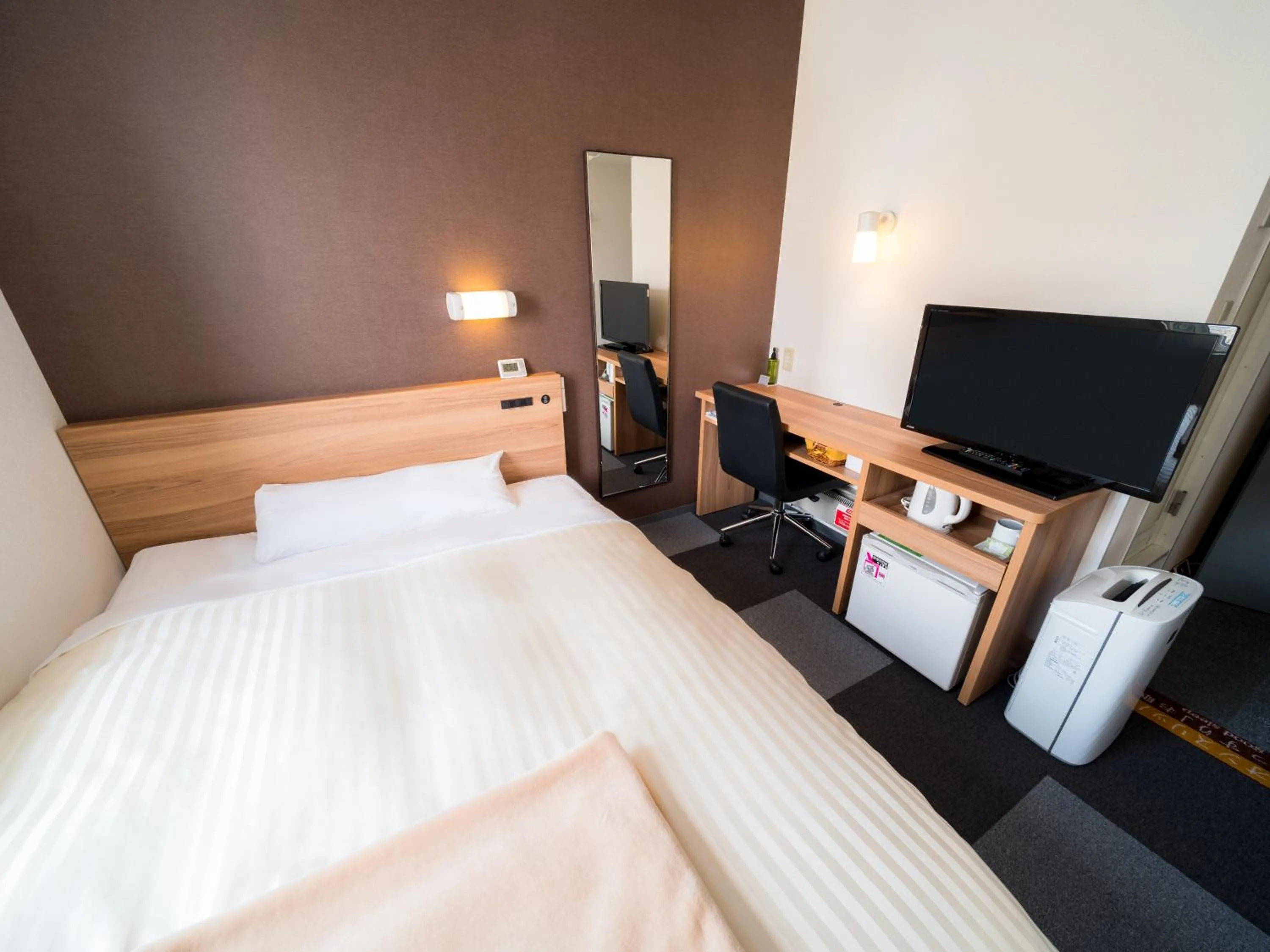 Bed in Super Hotel Morioka