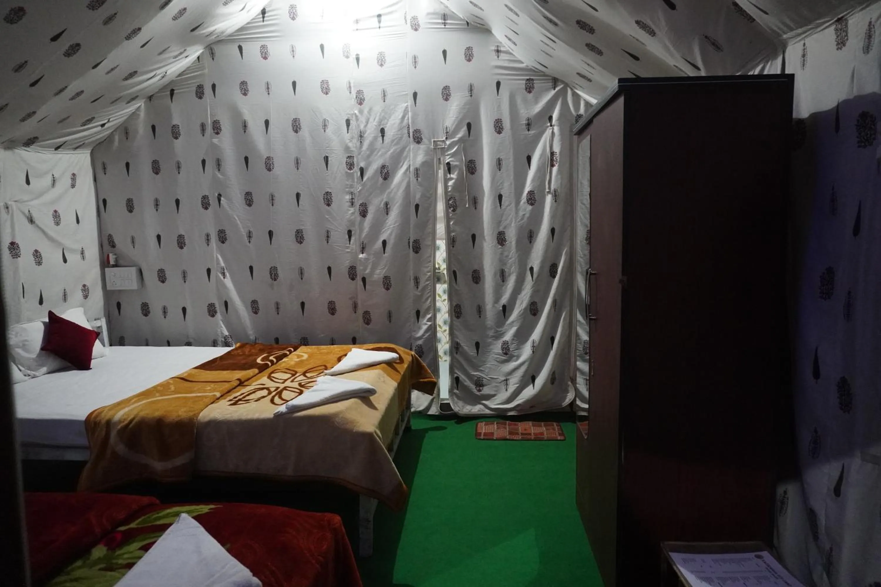 wardrobe, Bed in Kaziranga Eco Camp