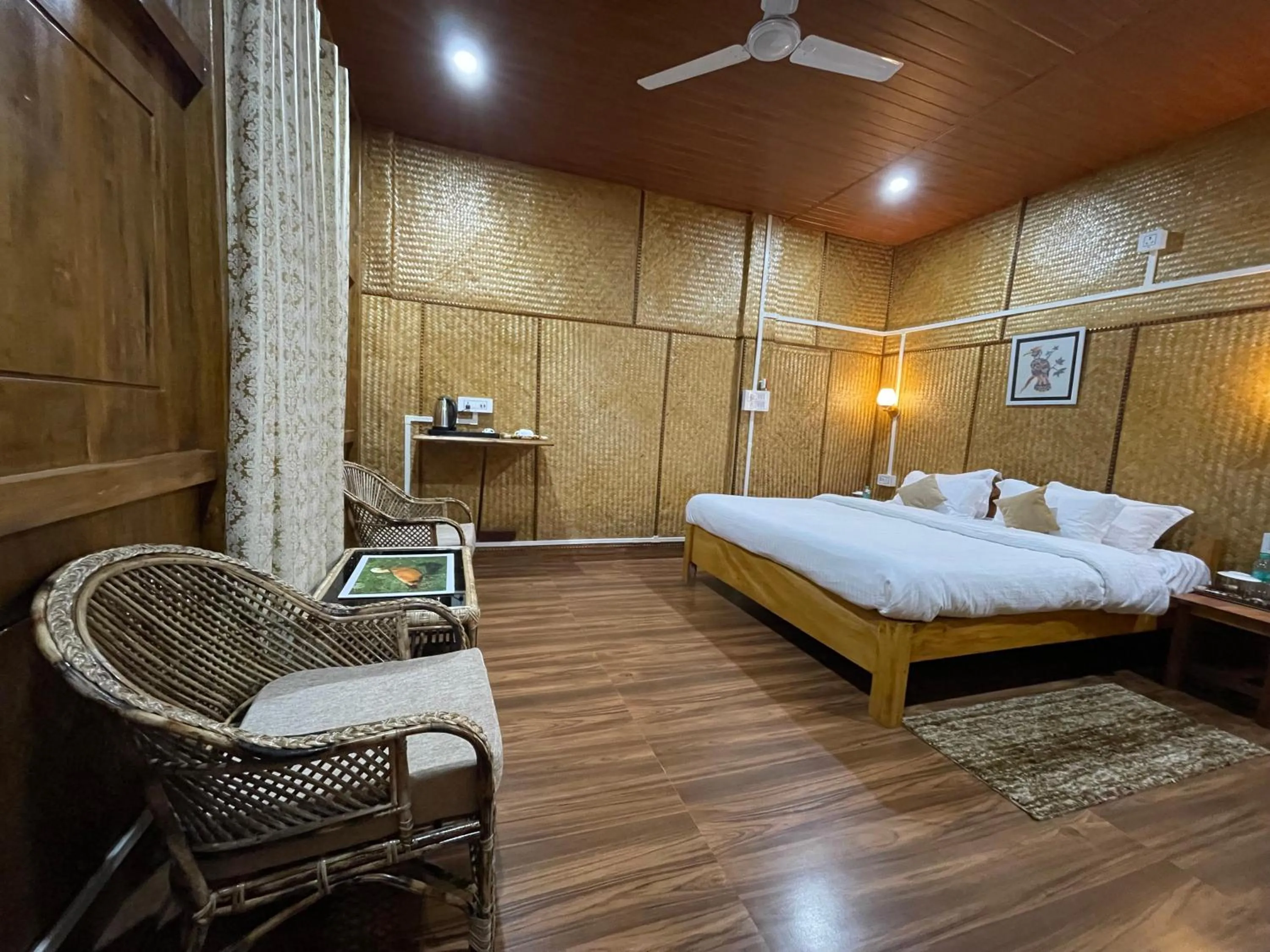 Bed in Kaziranga Eco Camp