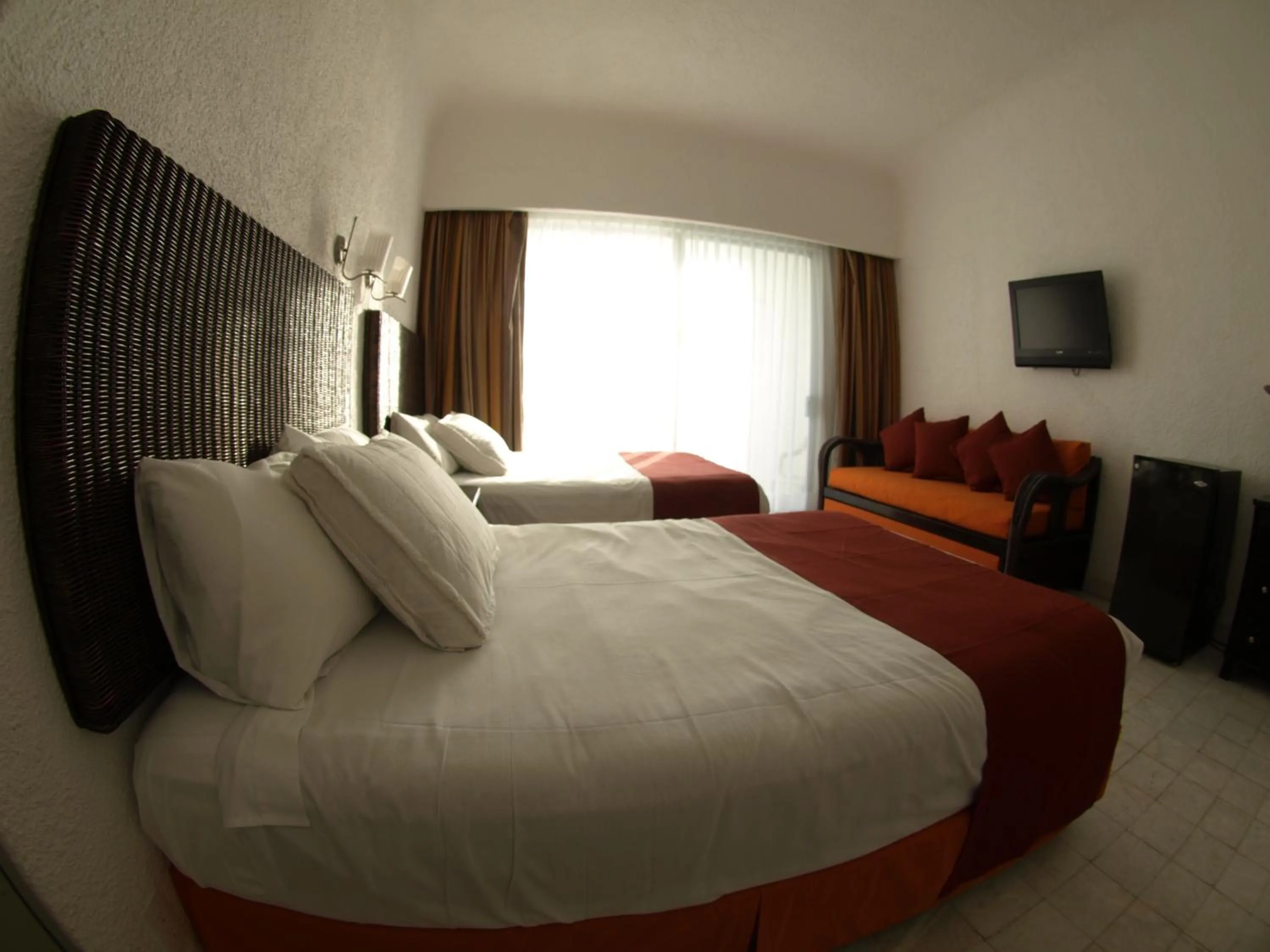 Bed in Sierra Mar at Tesoro Manzanillo