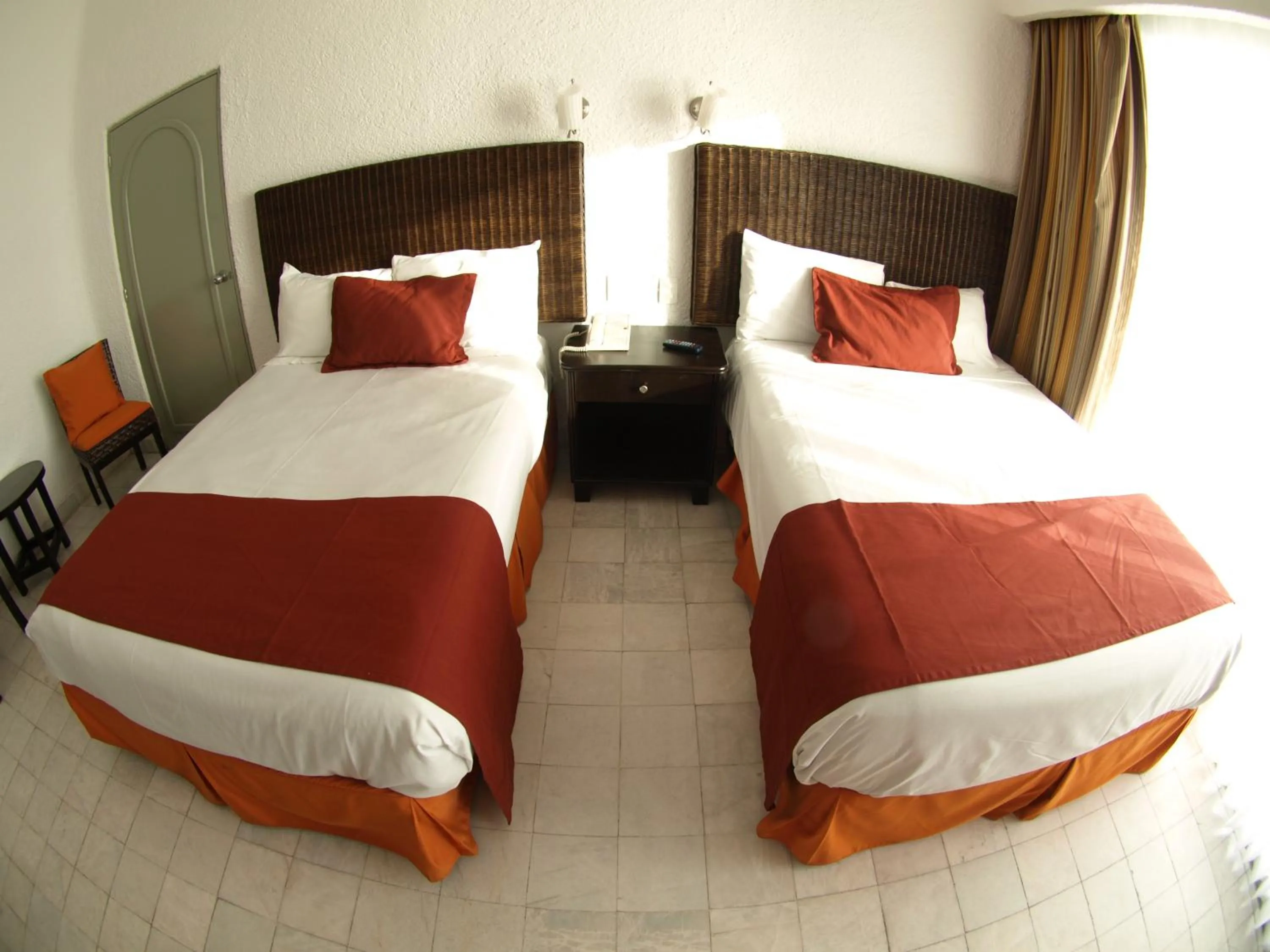 Bed in Sierra Mar at Tesoro Manzanillo