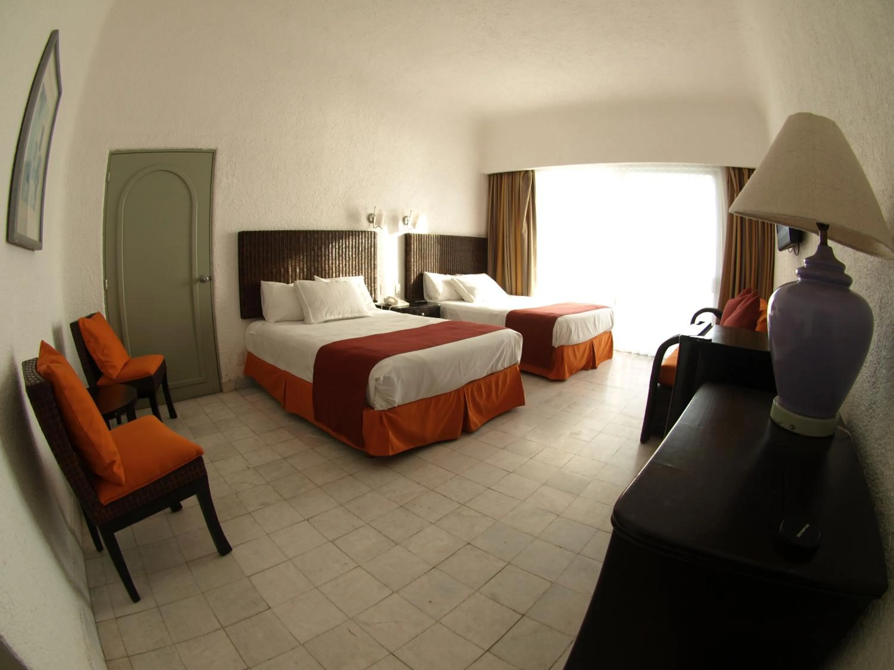 Photo of the whole room, Bed in Sierra Mar at Tesoro Manzanillo
