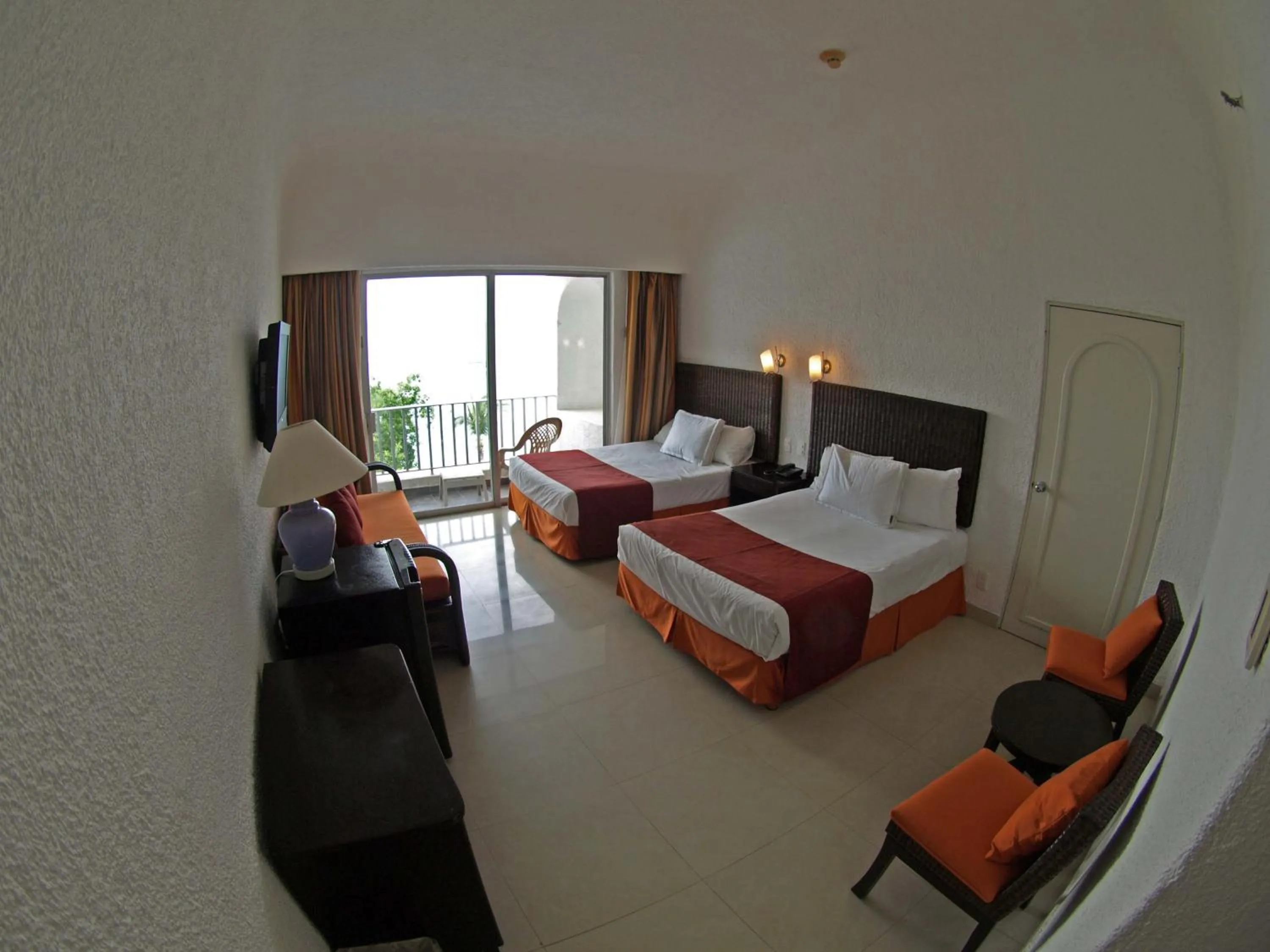 Photo of the whole room, Bed in Sierra Mar at Tesoro Manzanillo