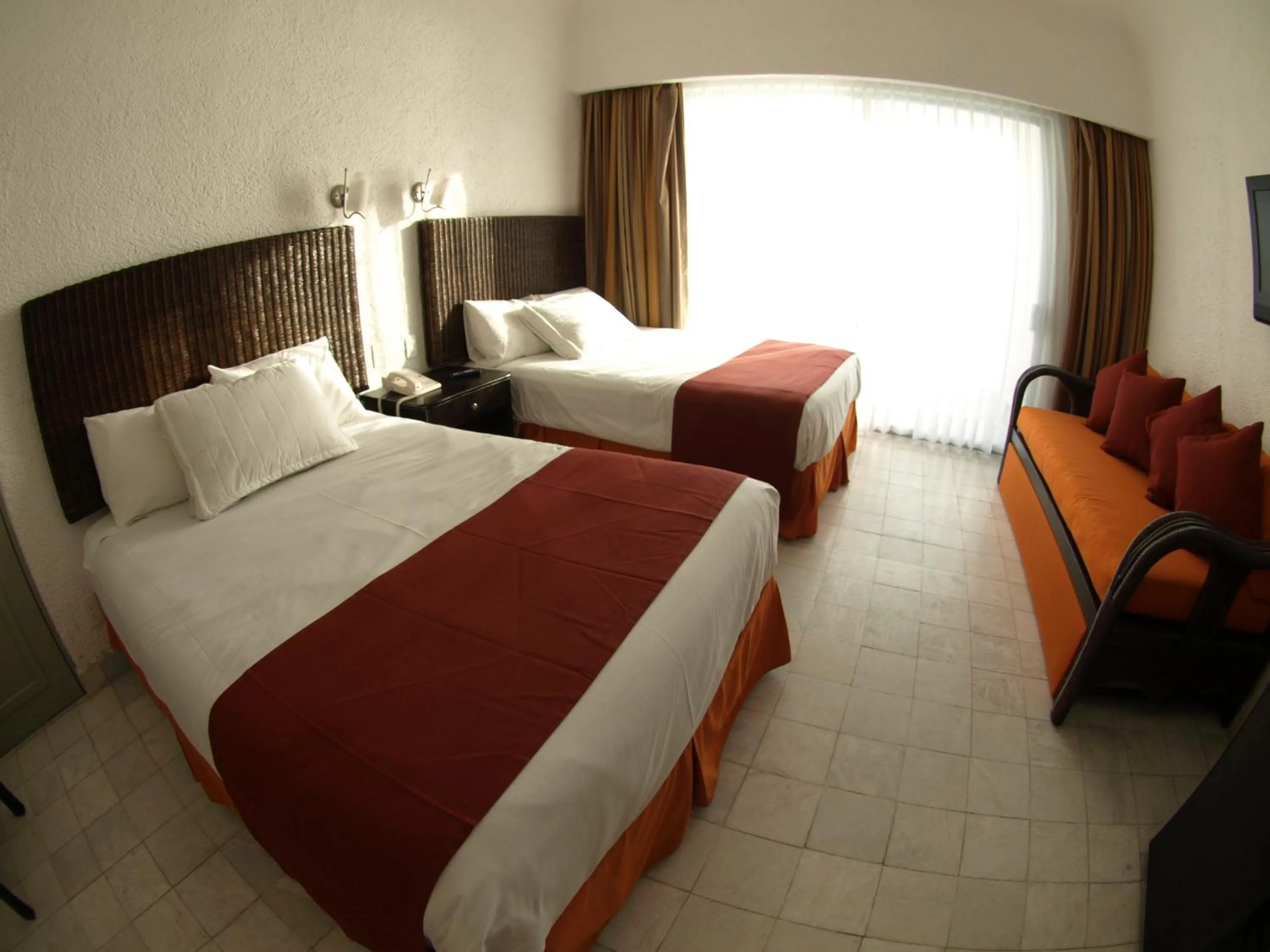Photo of the whole room, Bed in Sierra Mar at Tesoro Manzanillo