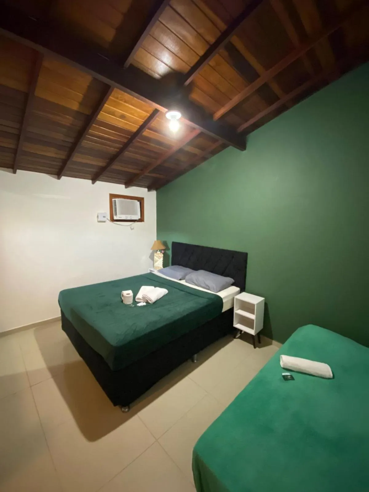 Bed in Pousada Ferradura Beach