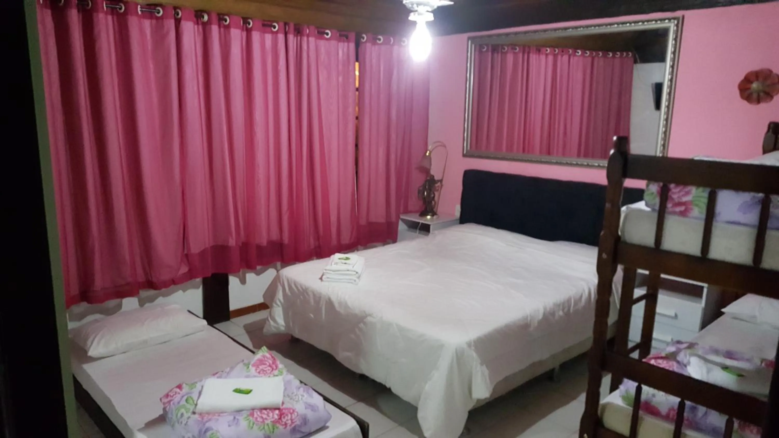 Bed in Pousada Ferradura Beach