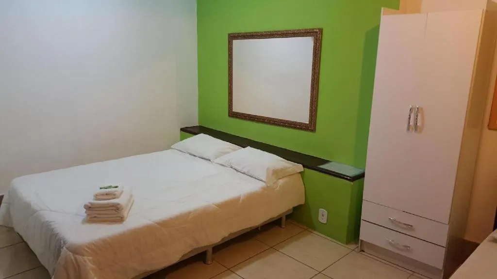 Bed in Pousada Ferradura Beach