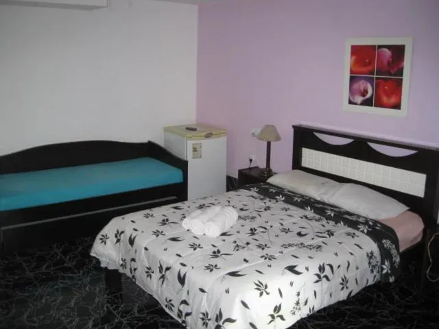 Bed in Pousada Ferradura Beach