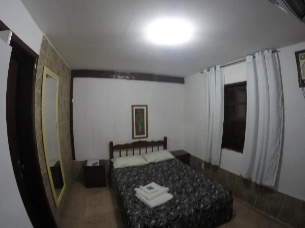 Bed in Pousada Ferradura Beach