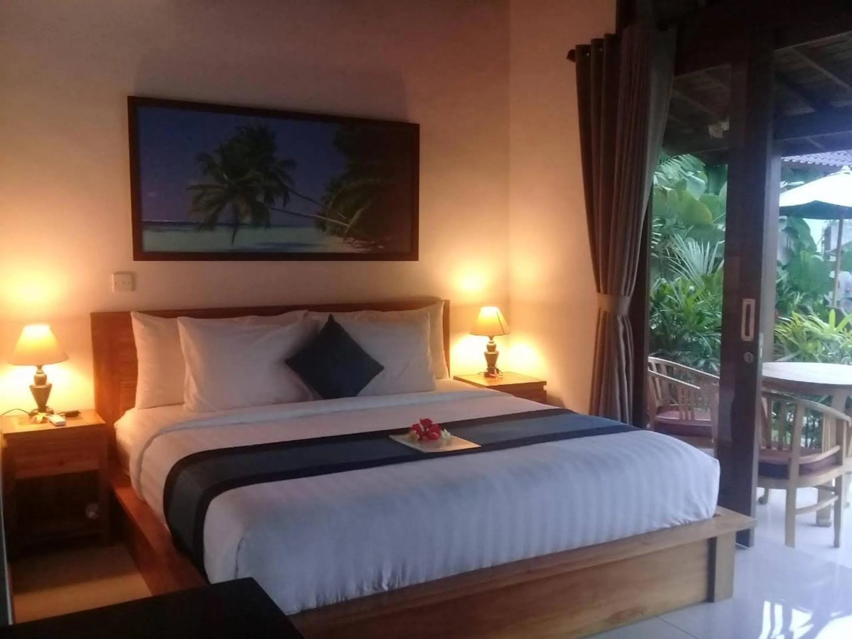 Bed in Paraiso Cottage Ubud