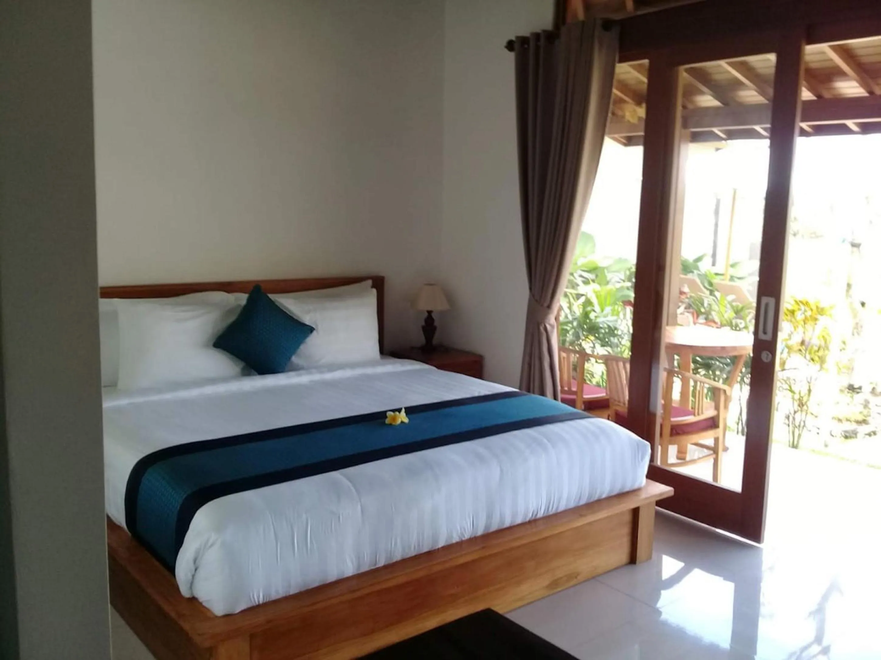 Bed in Paraiso Cottage Ubud