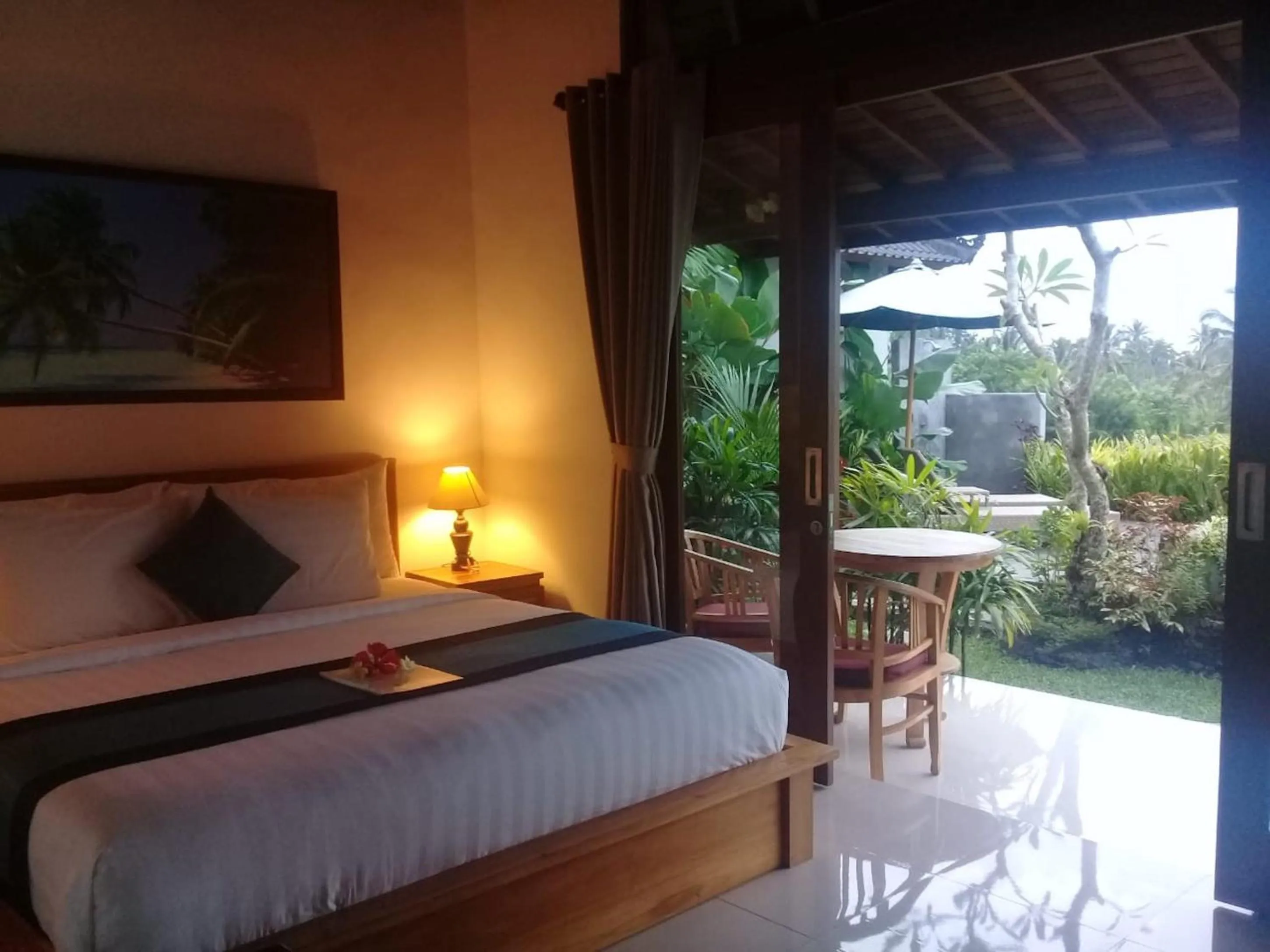 Bed in Paraiso Cottage Ubud