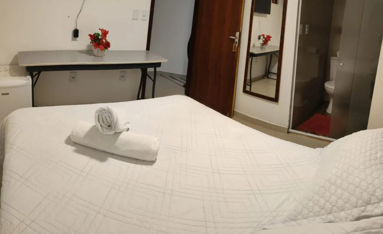 Bed in Cabanos Suites