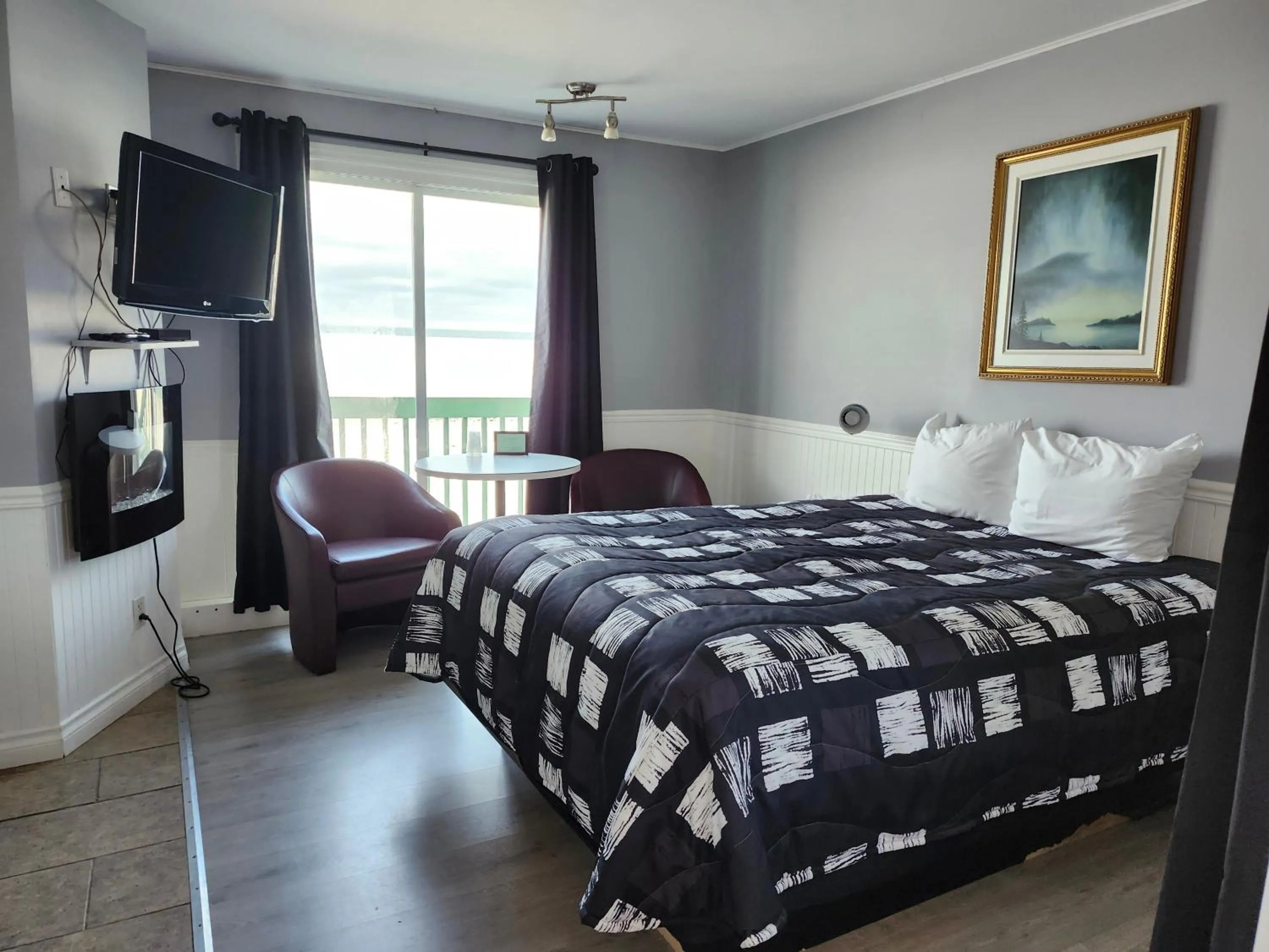 Bed in Motel Rimouski