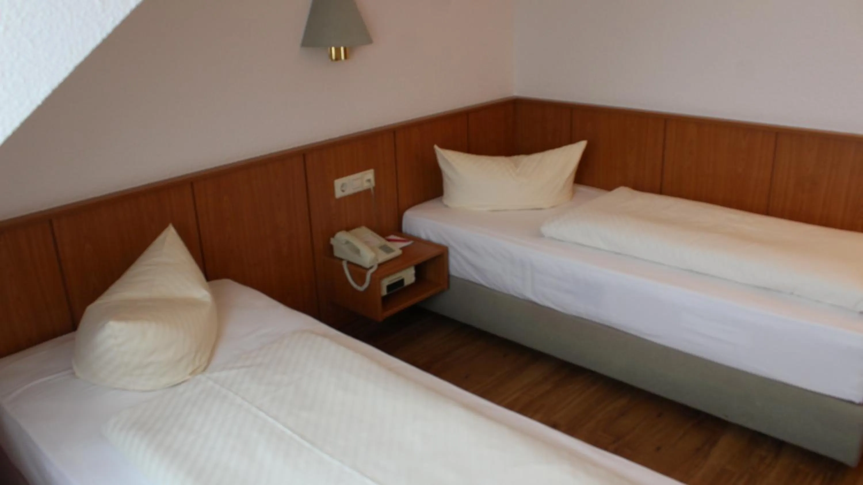 Bed in Hotel Weisser Schwan