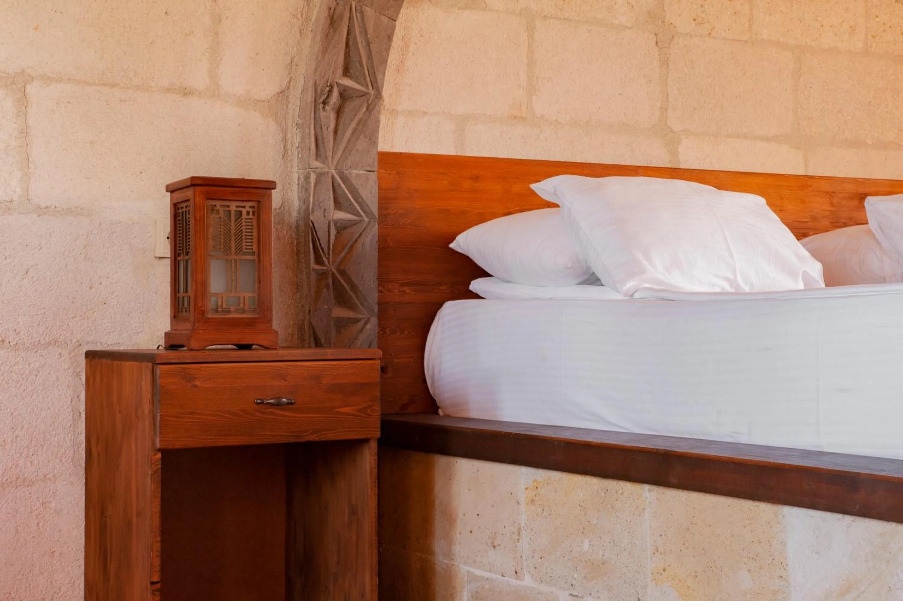 Bed in Ottoman Cave Suites