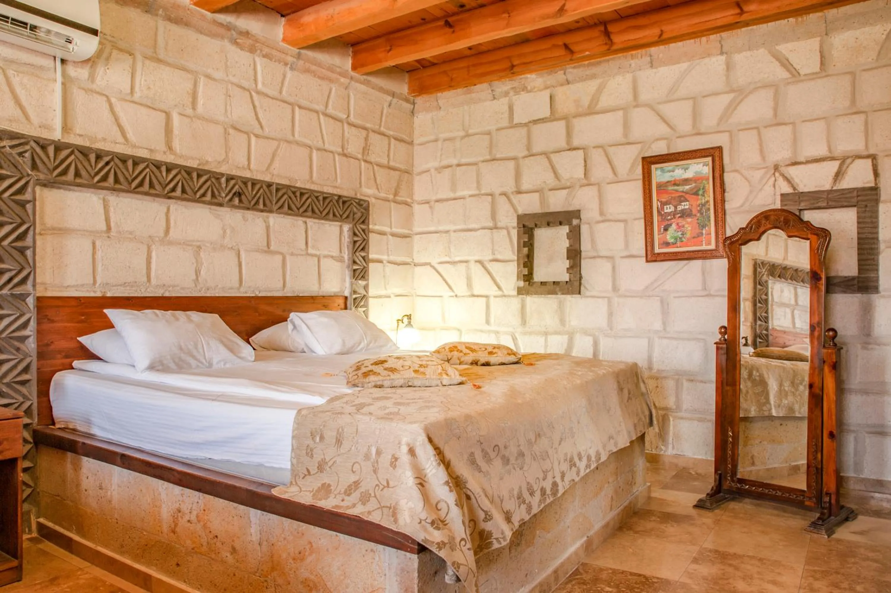 Bed in Ottoman Cave Suites