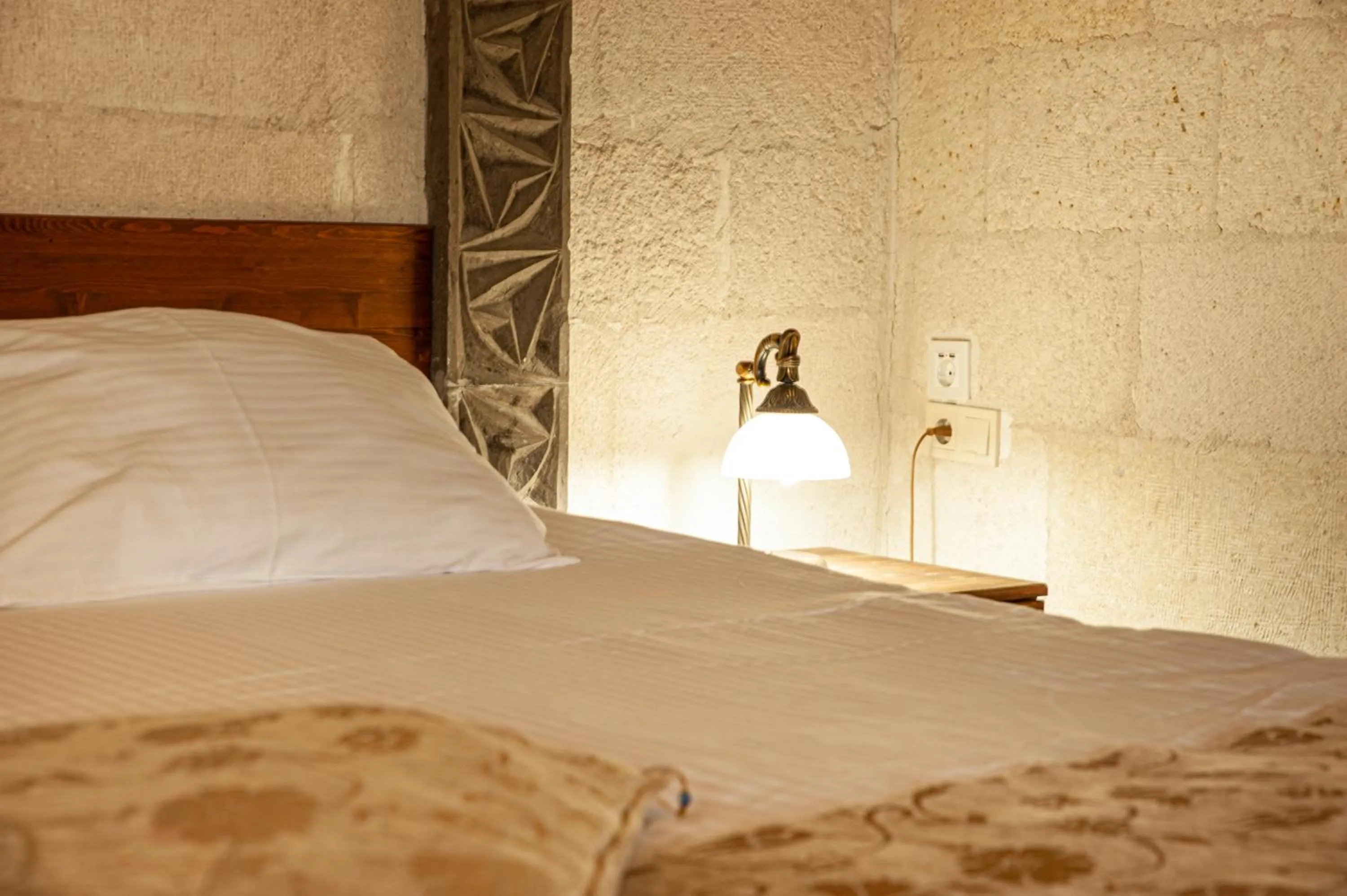 Bed in Ottoman Cave Suites