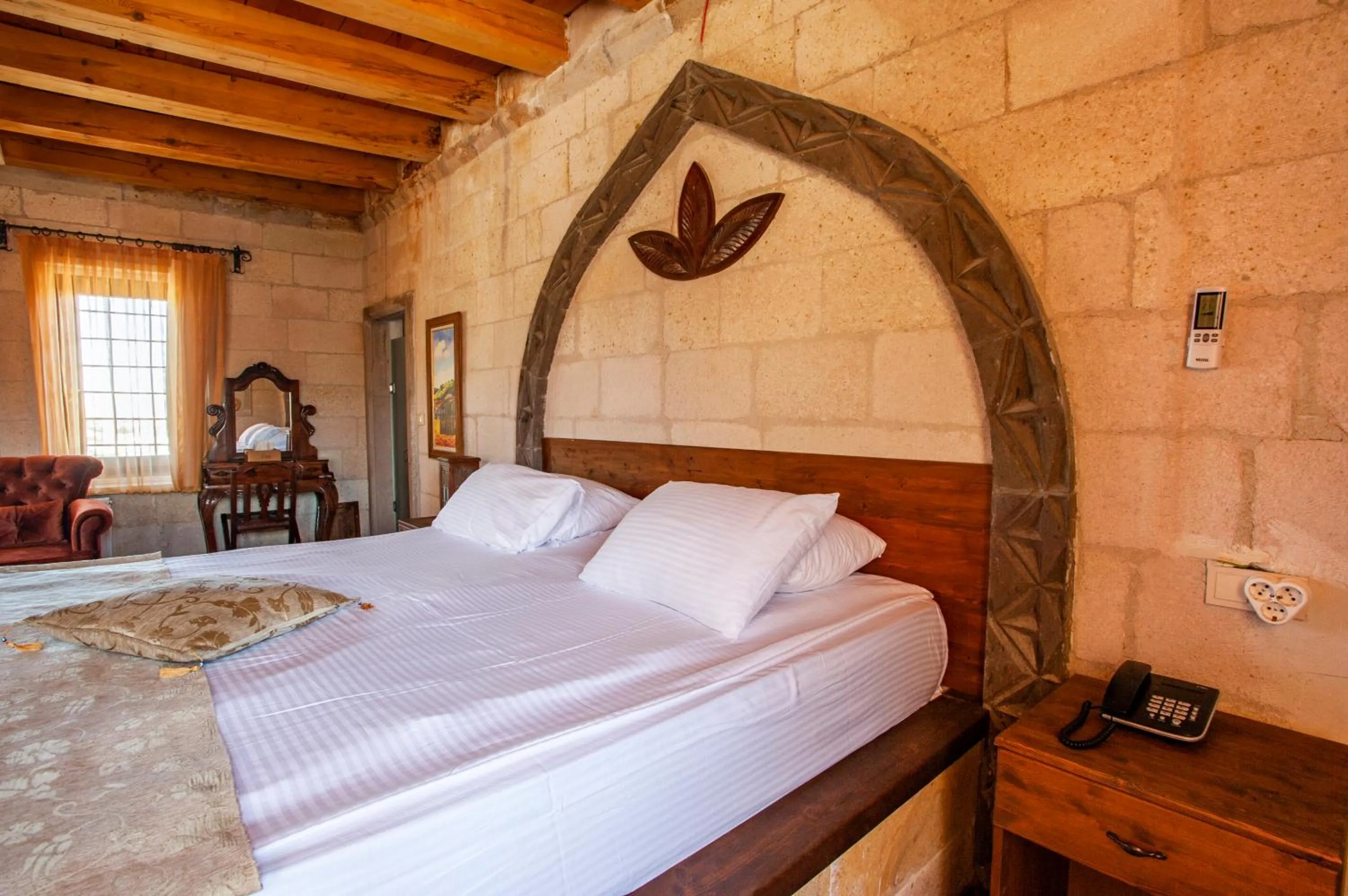 Bed in Ottoman Cave Suites