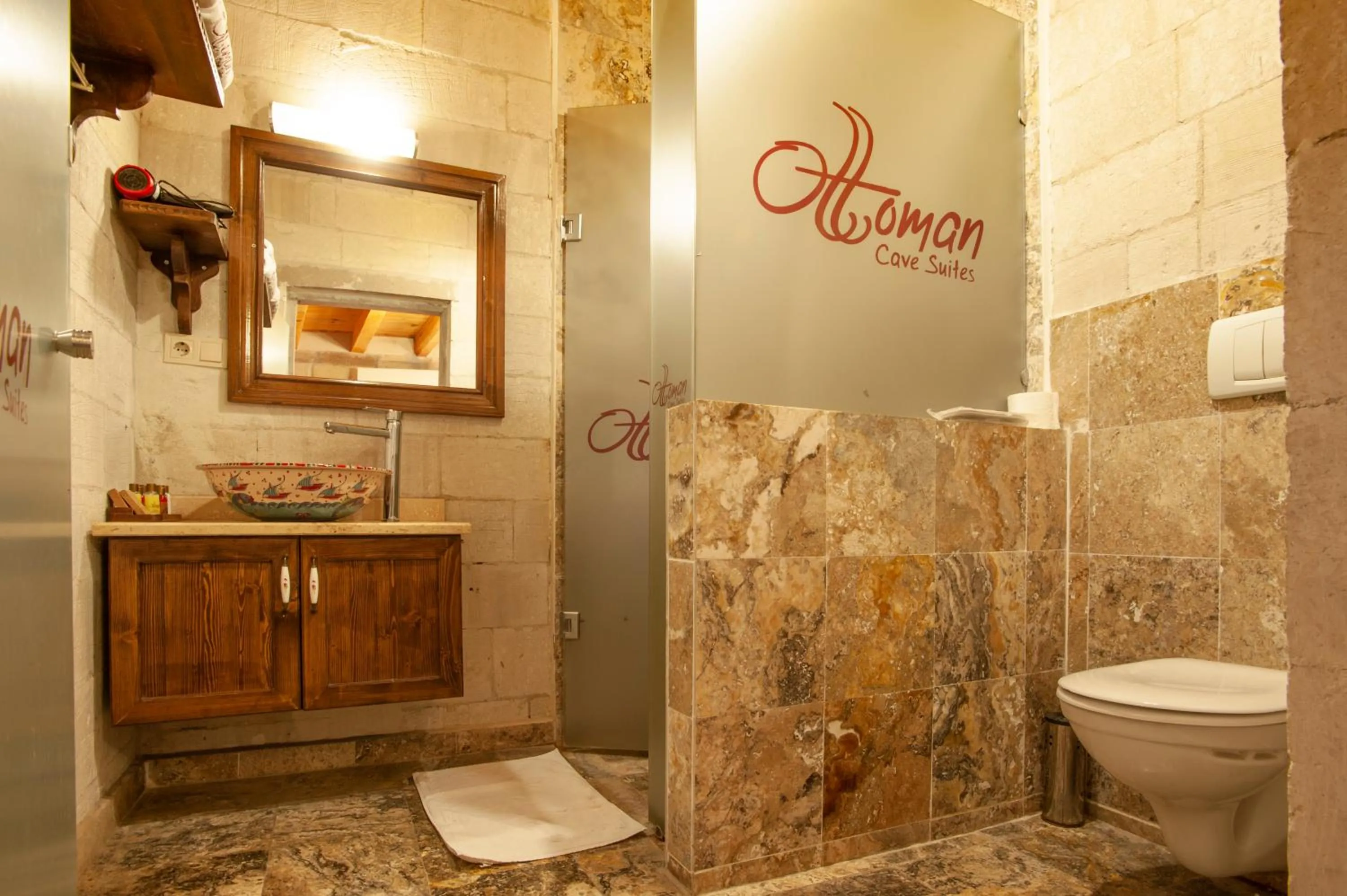 Property logo or sign in Ottoman Cave Suites