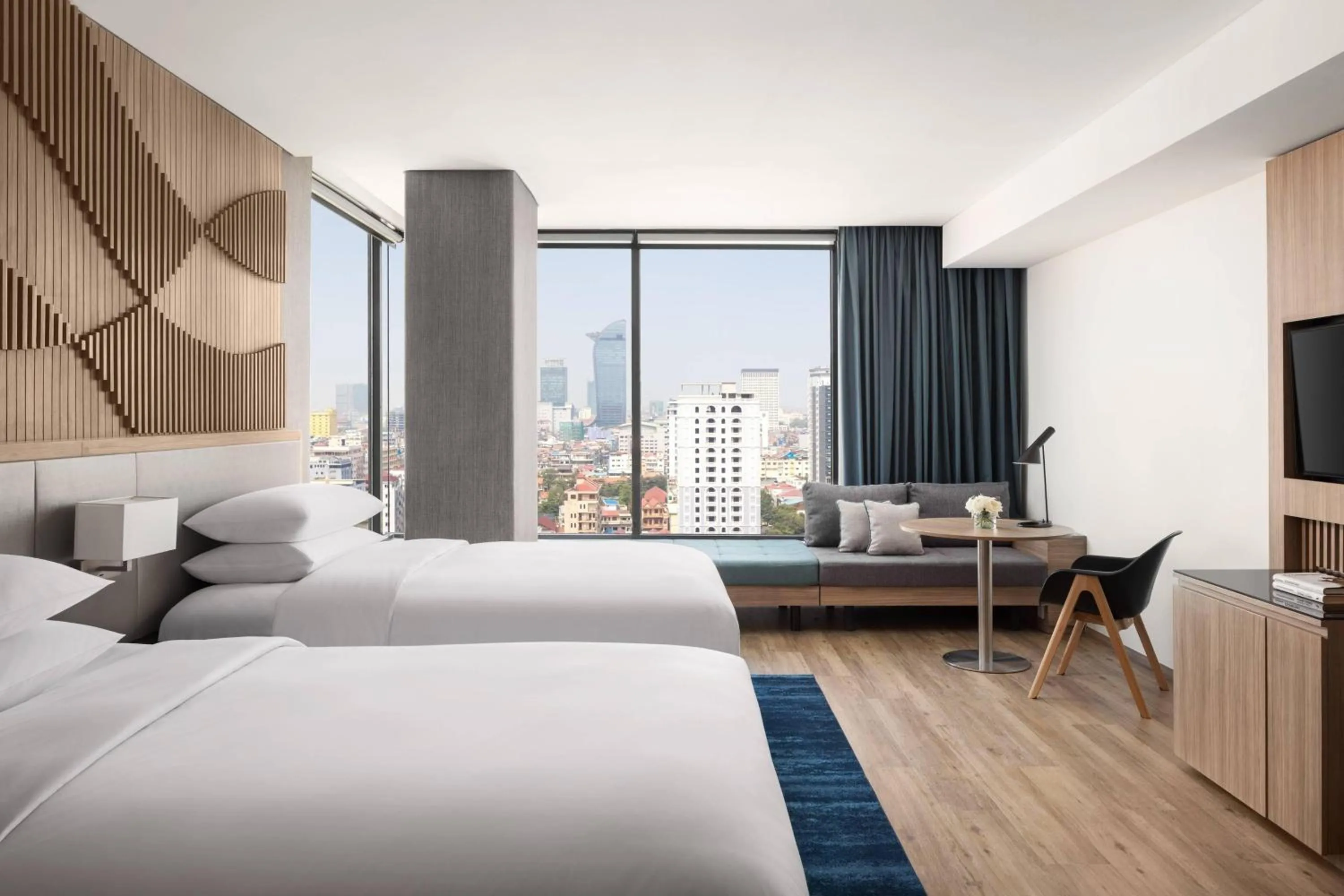 Living room, Bed in Courtyard by Marriott Phnom Penh