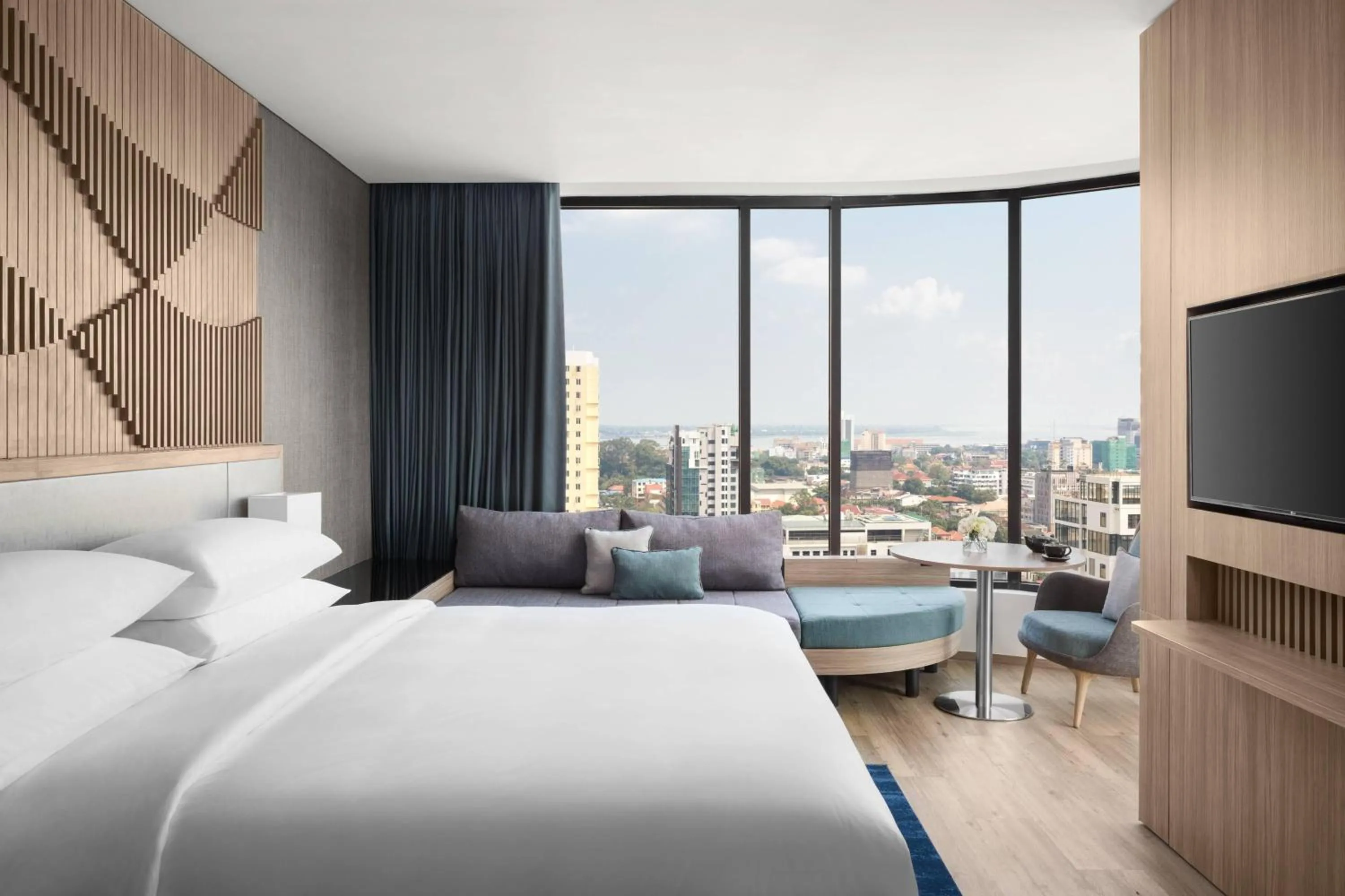 Photo of the whole room, Bed in Courtyard by Marriott Phnom Penh