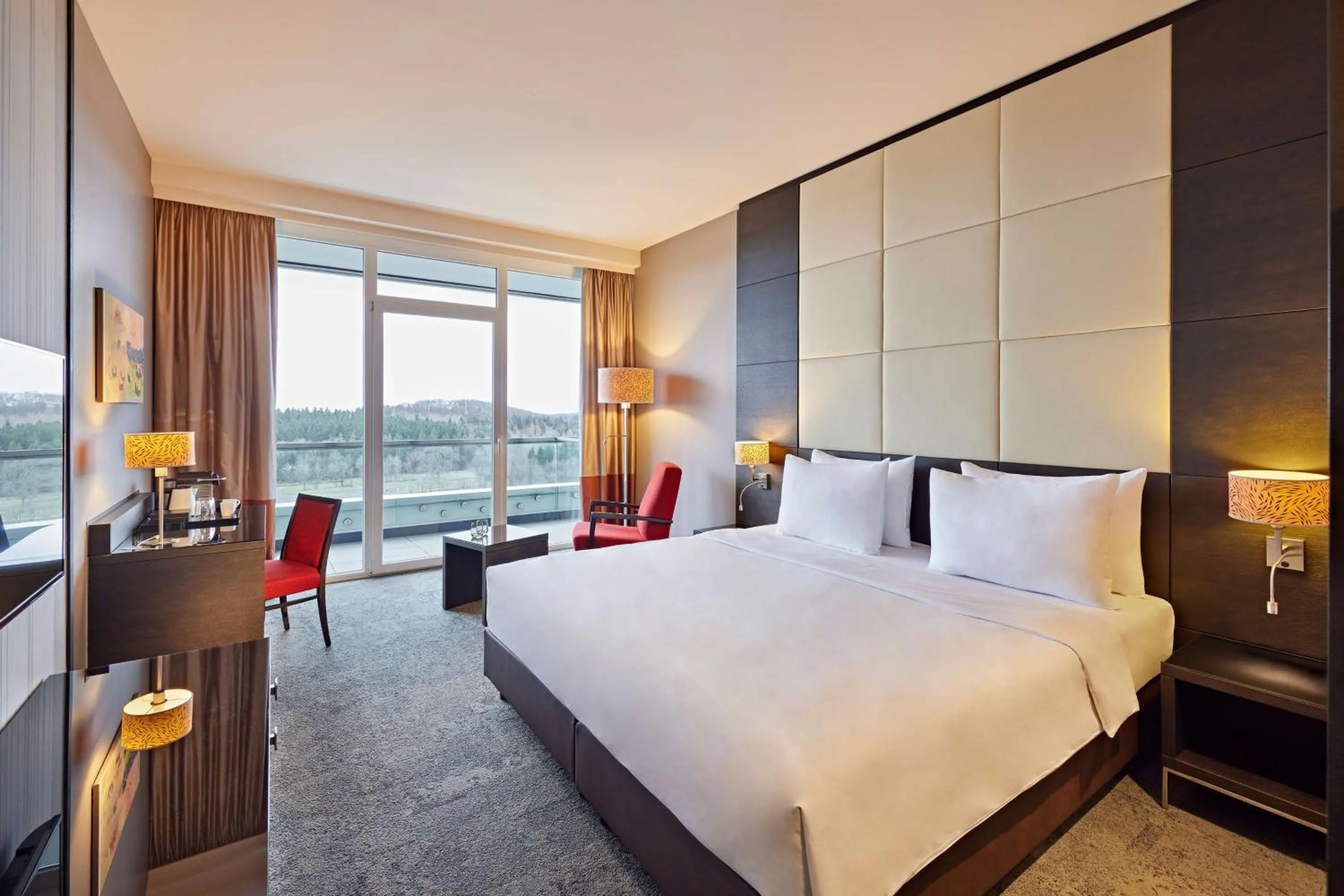 Photo of the whole room, Bed in Nürburgring Congress Hotel