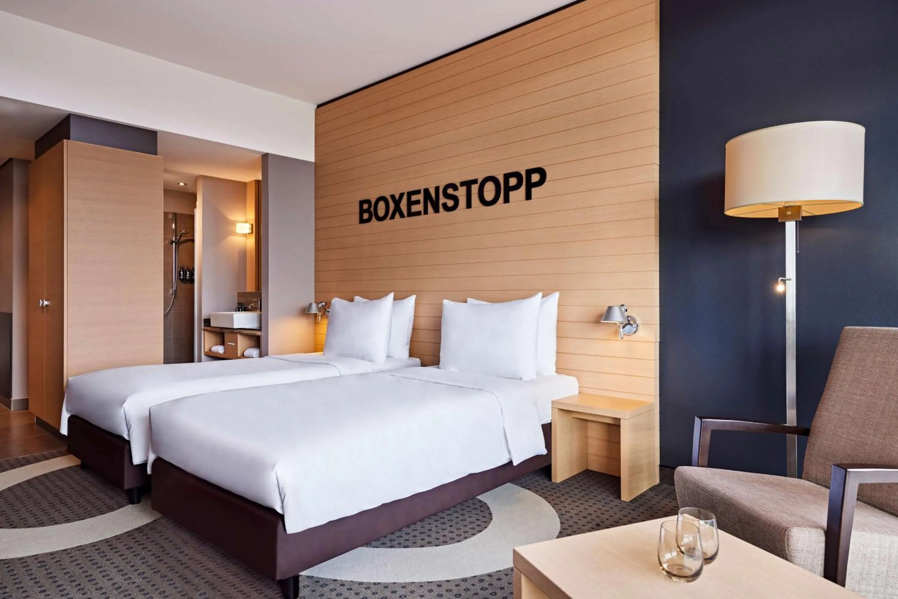 Photo of the whole room, Bed in Nürburgring Congress Hotel