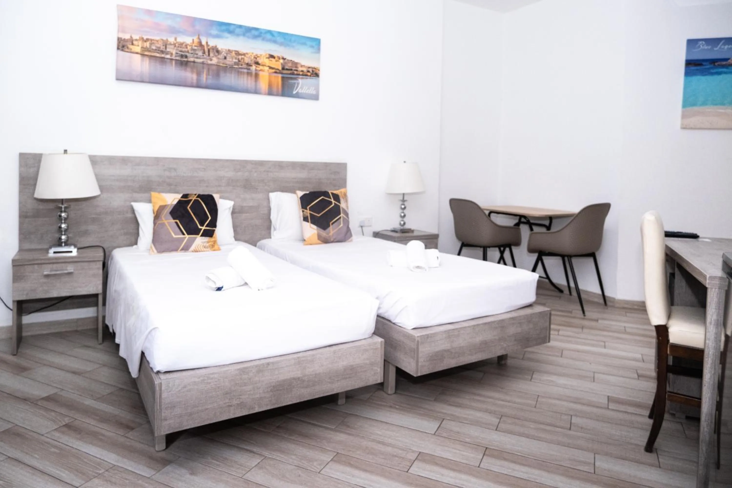 Bed in Napoli Suites Studios Aparthotel