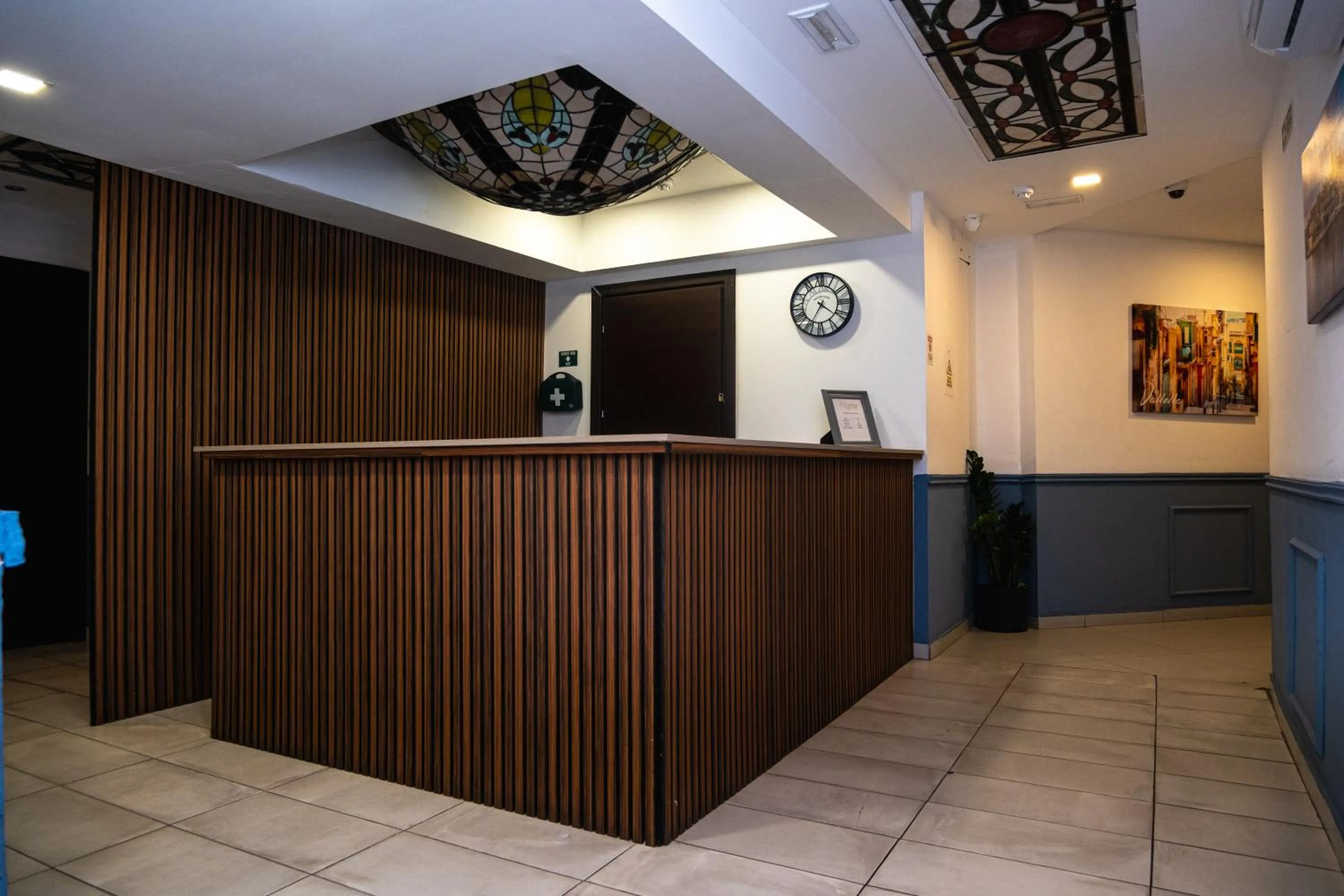 Lobby or reception in Napoli Suites Studios Aparthotel