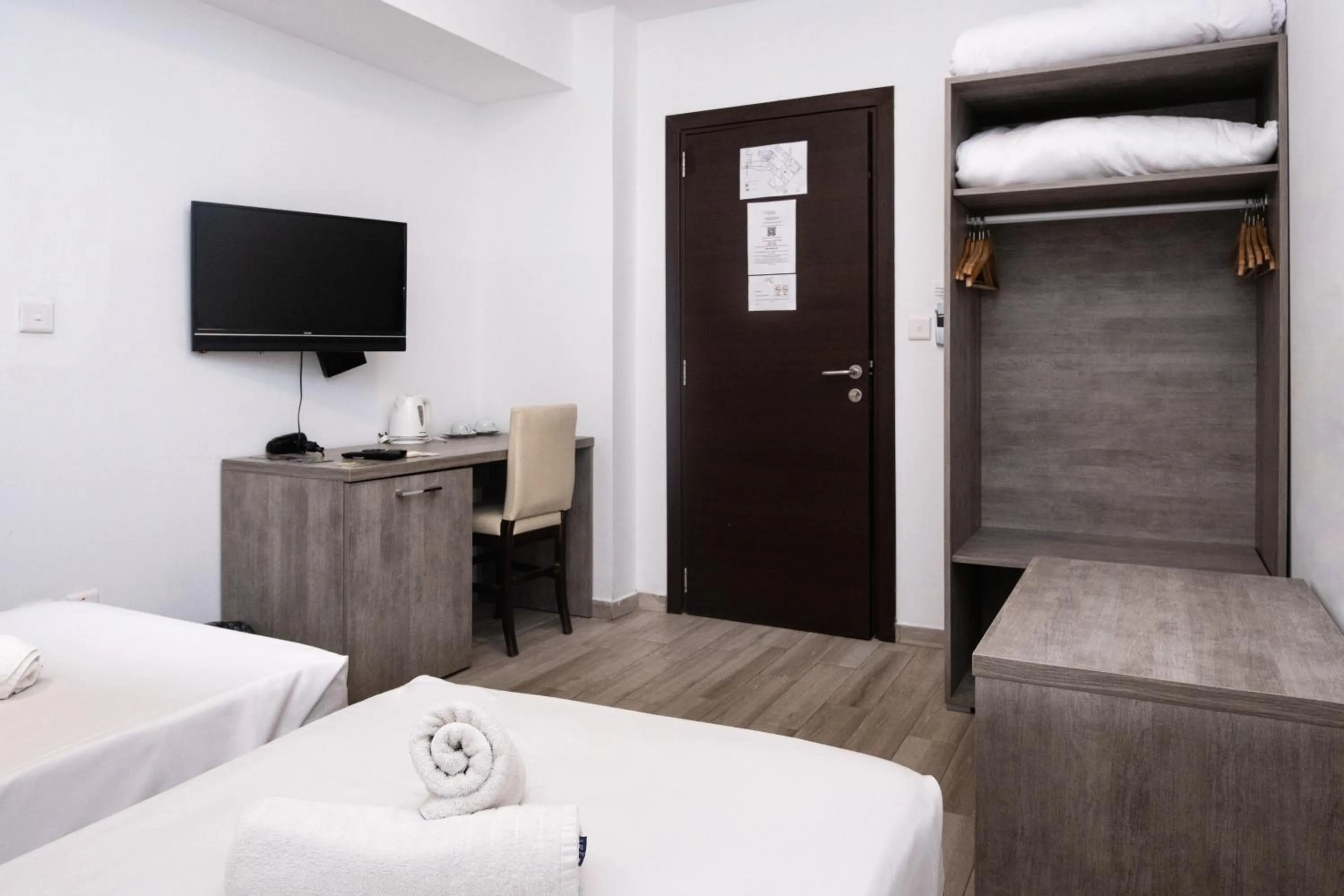 Bed in Napoli Suites Studios Aparthotel