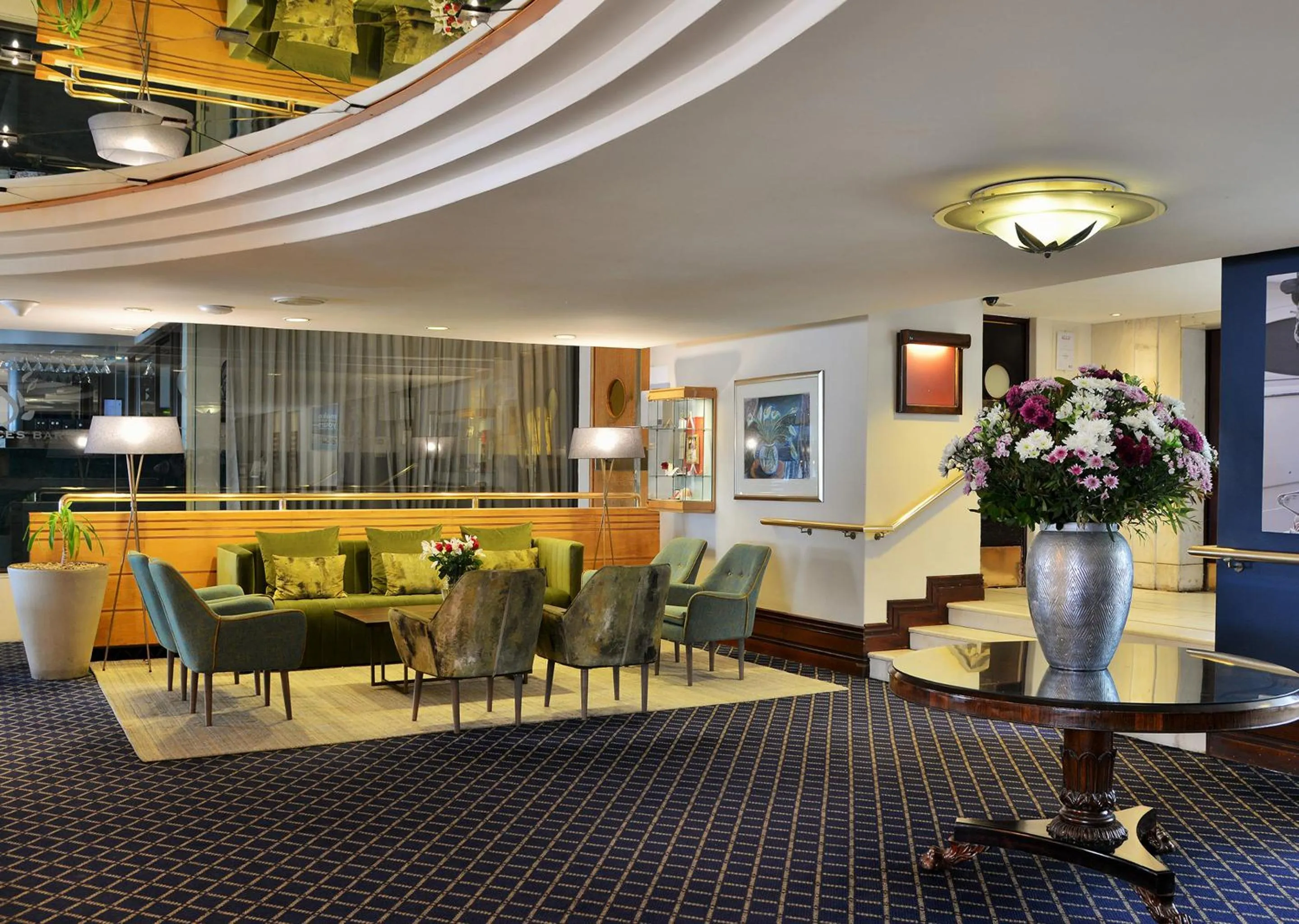 Lobby or reception in Peninsula All Suite Hotel by Dream Resorts