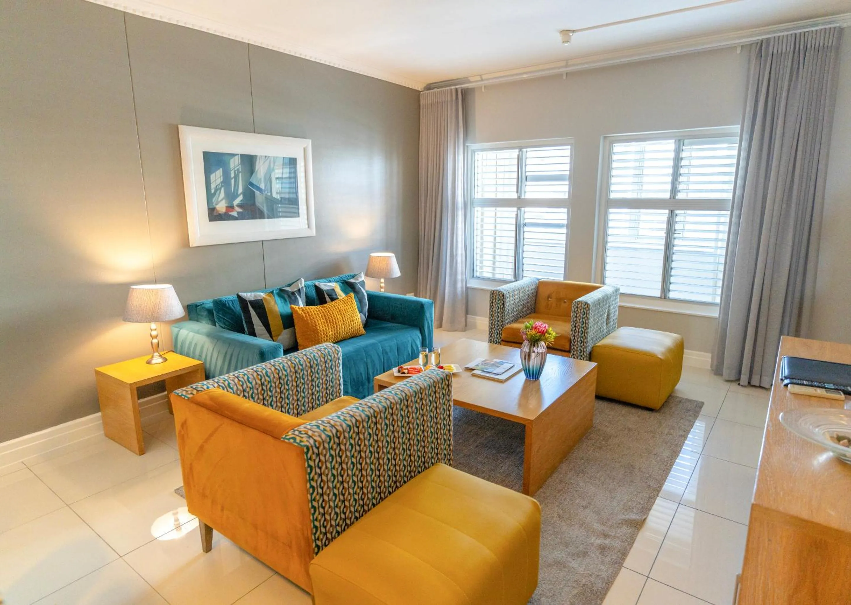 TV and multimedia in Peninsula All Suite Hotel by Dream Resorts