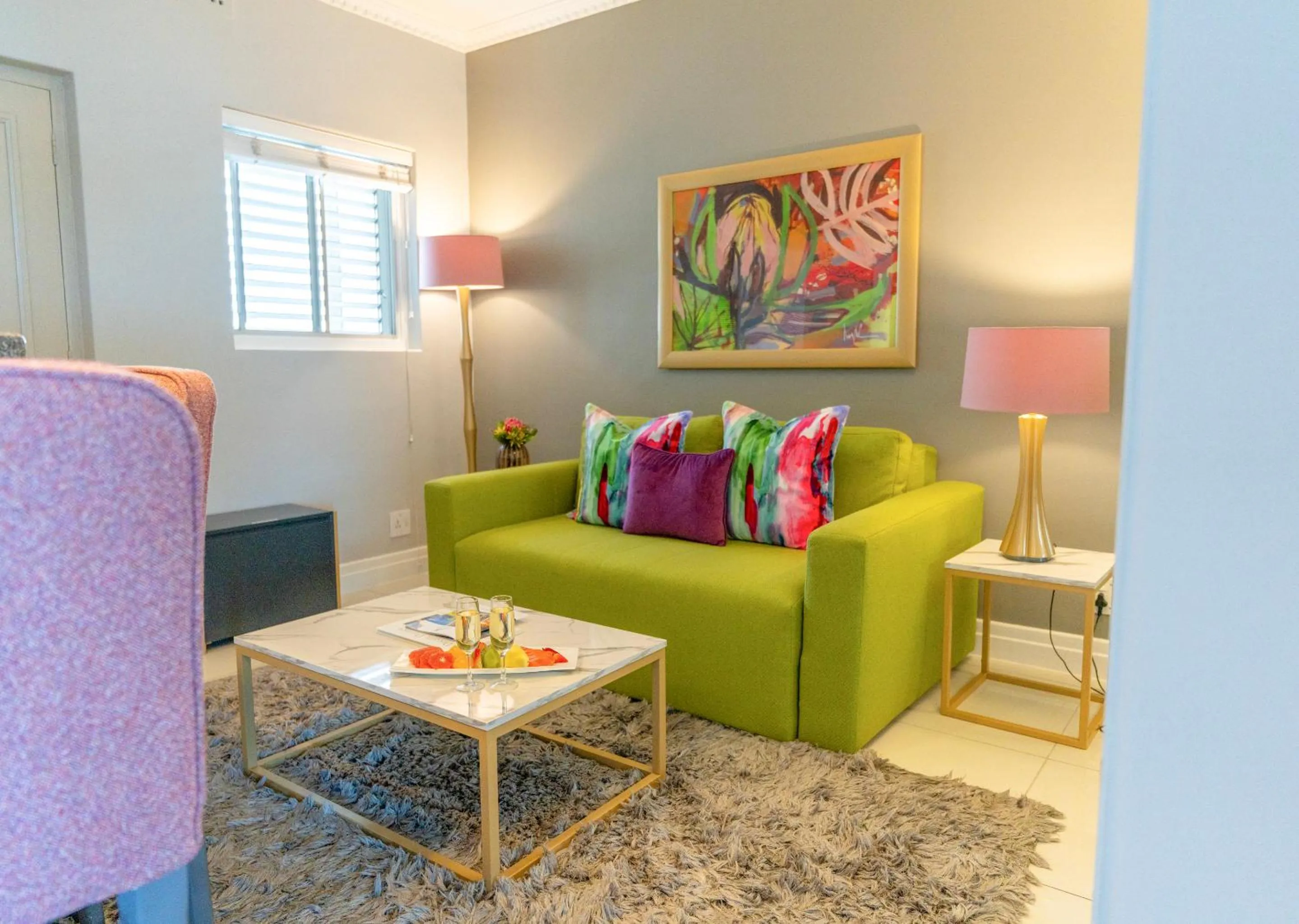 Living room in Peninsula All Suite Hotel by Dream Resorts