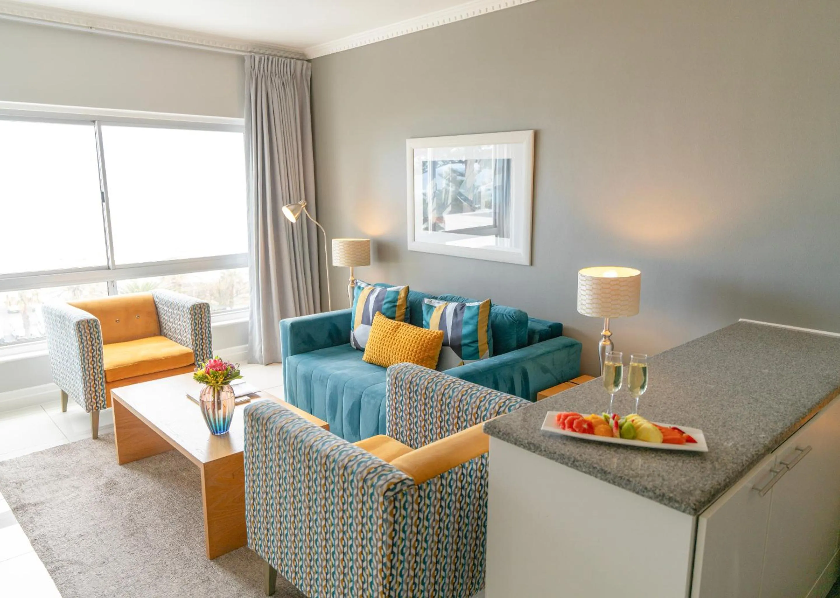 Living room in Peninsula All Suite Hotel by Dream Resorts