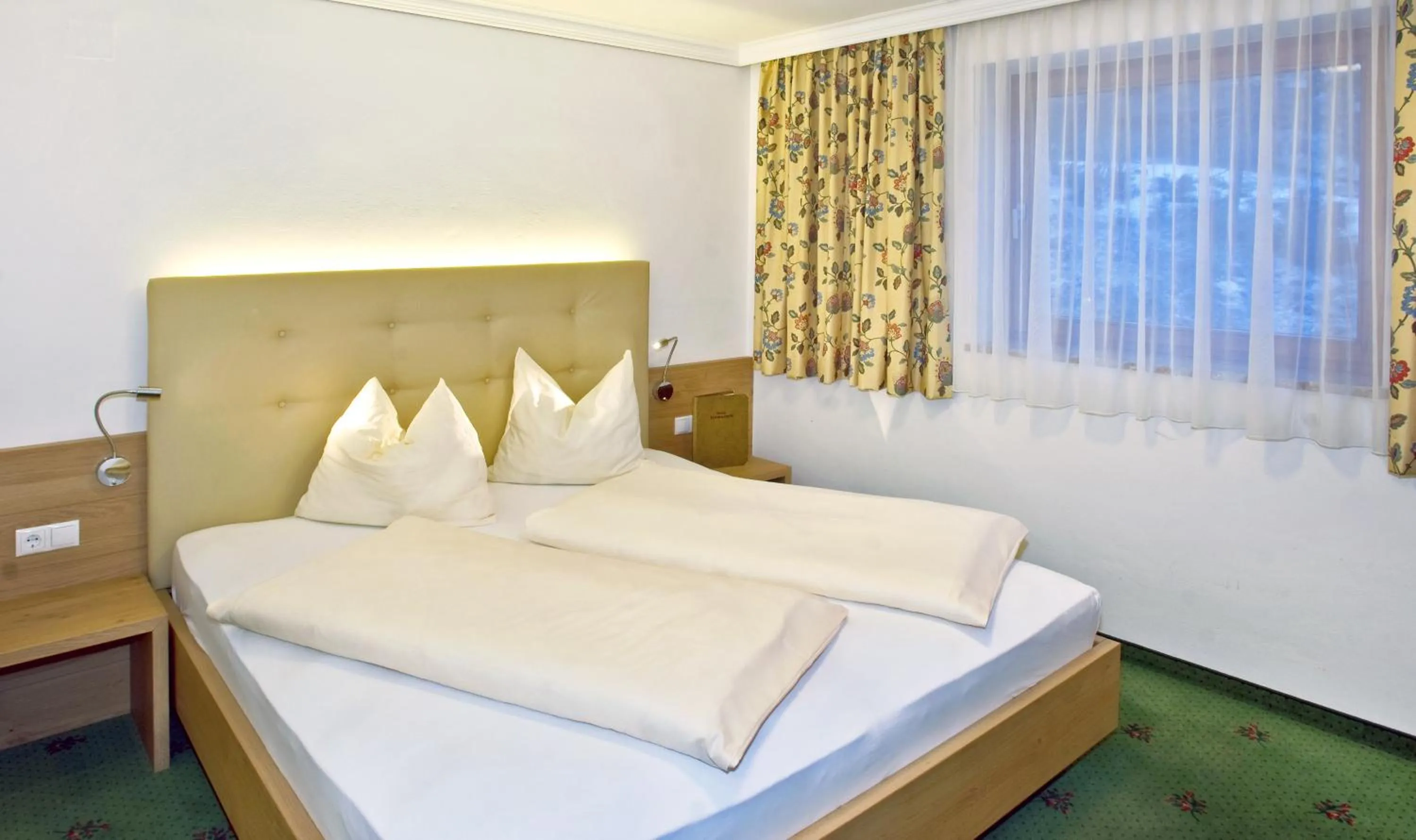 Bed in Hotel Berghof