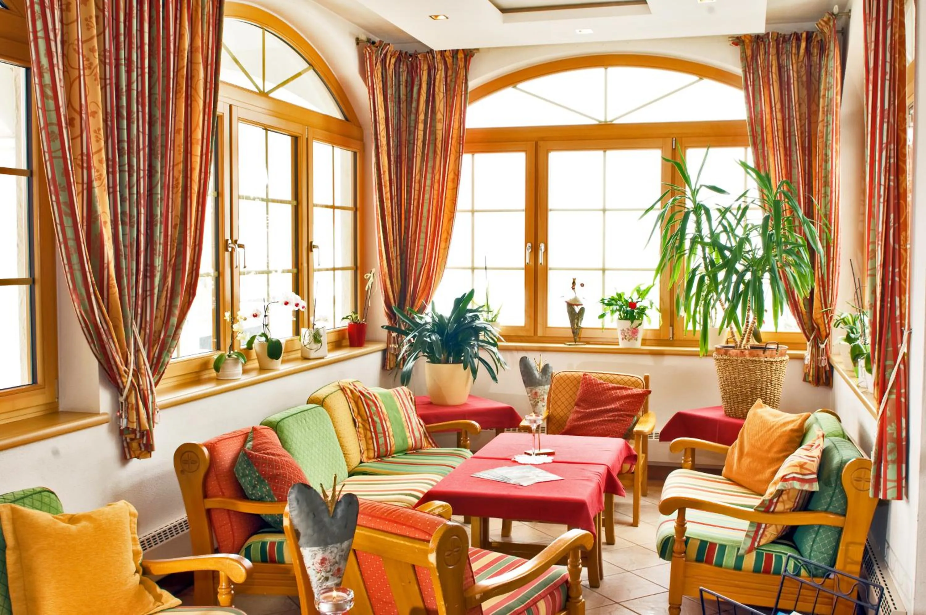 Communal lounge/ TV room in Hotel Berghof