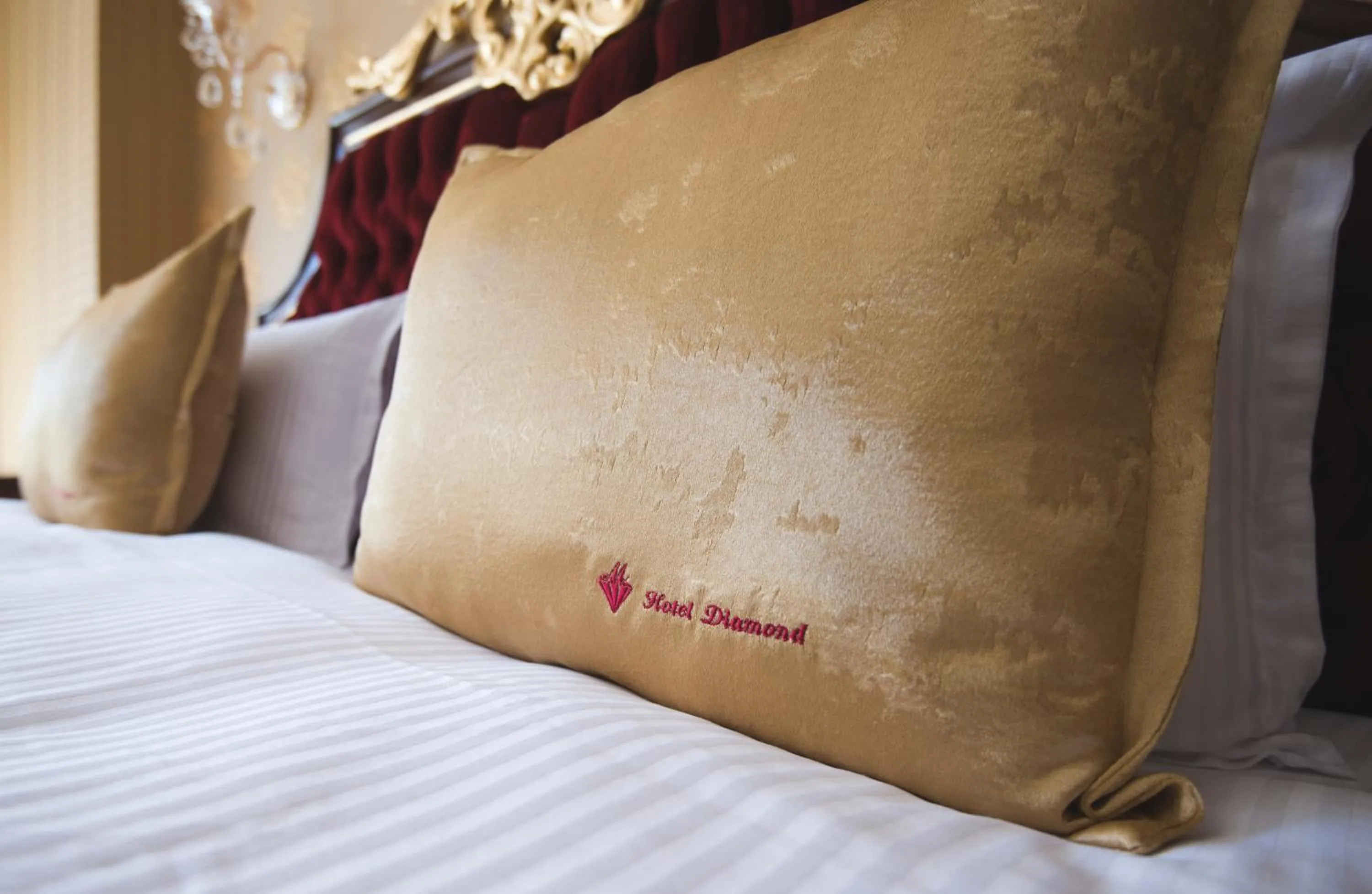 Bed in Hotel Diamond