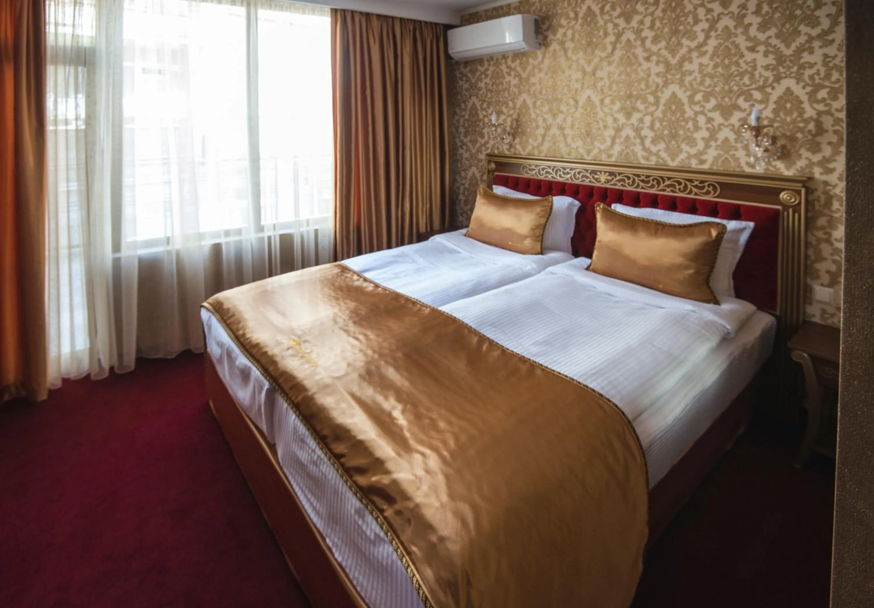 Bed in Hotel Diamond