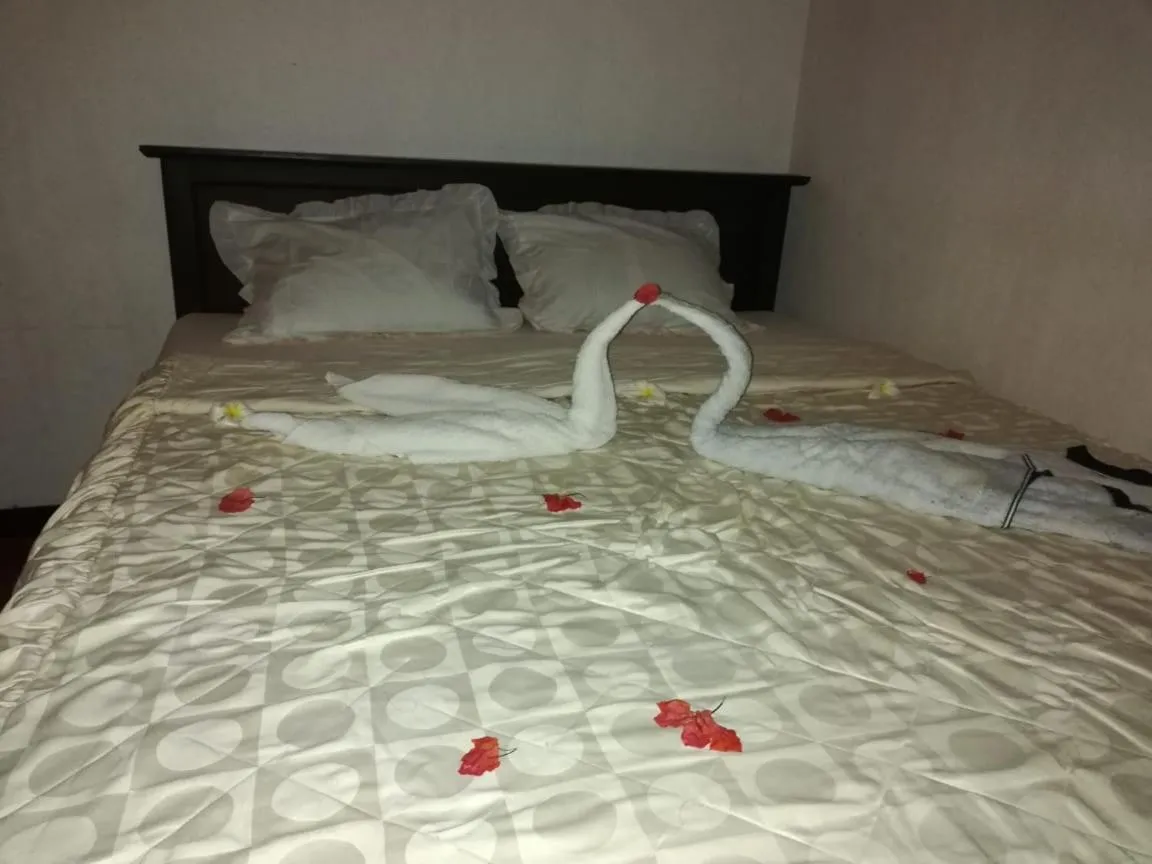 Bed in Triple One Villa