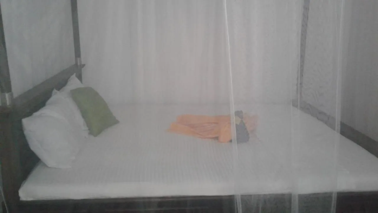 Bed in Triple One Villa