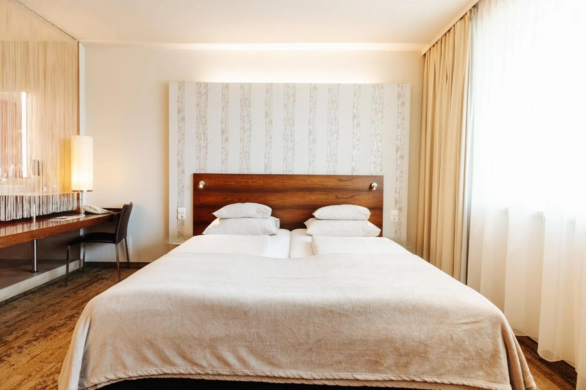 Property building, Bed in Das Seepark Wörthersee Resort