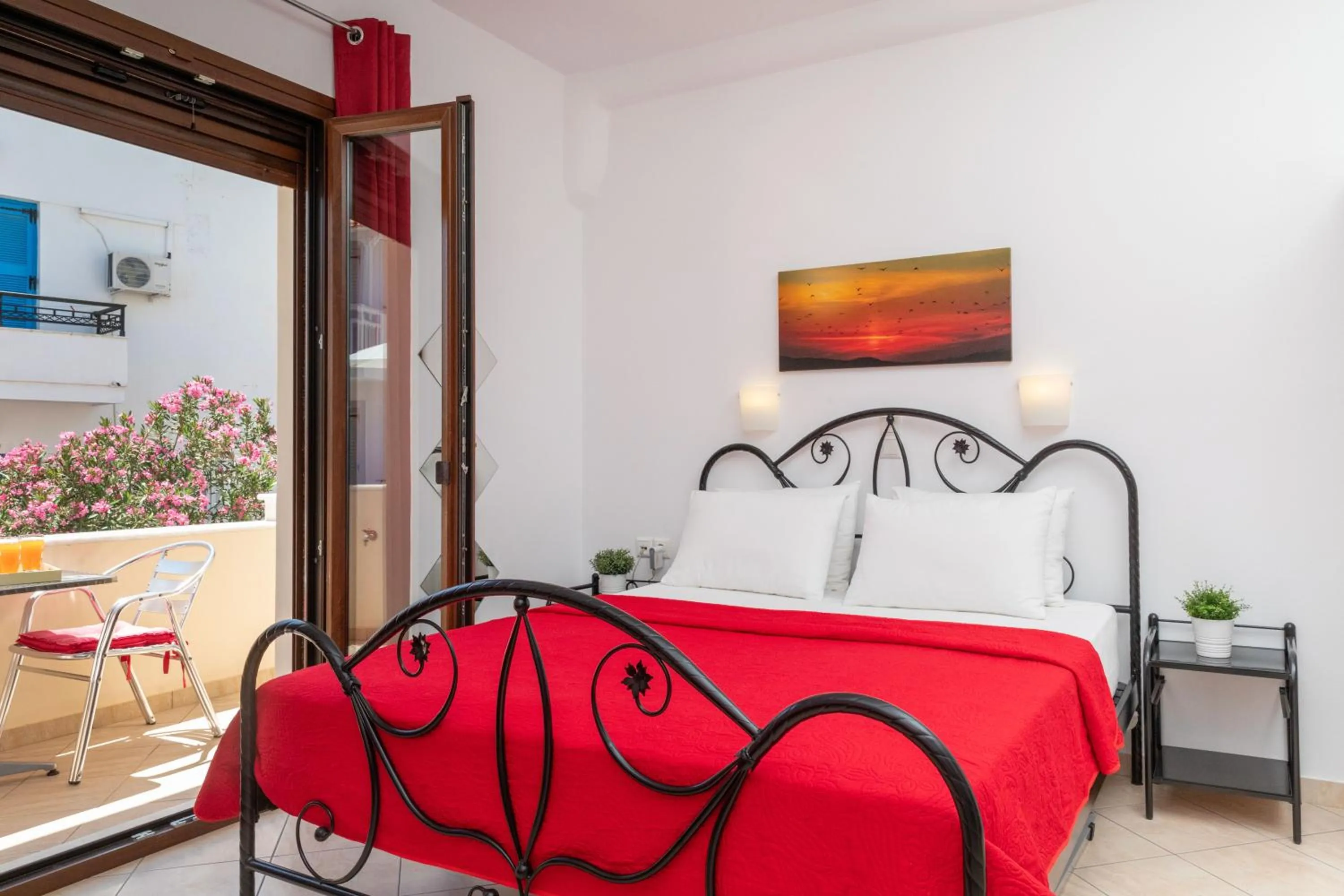 Bed in NAXOS DIAMOND Studios Apartments