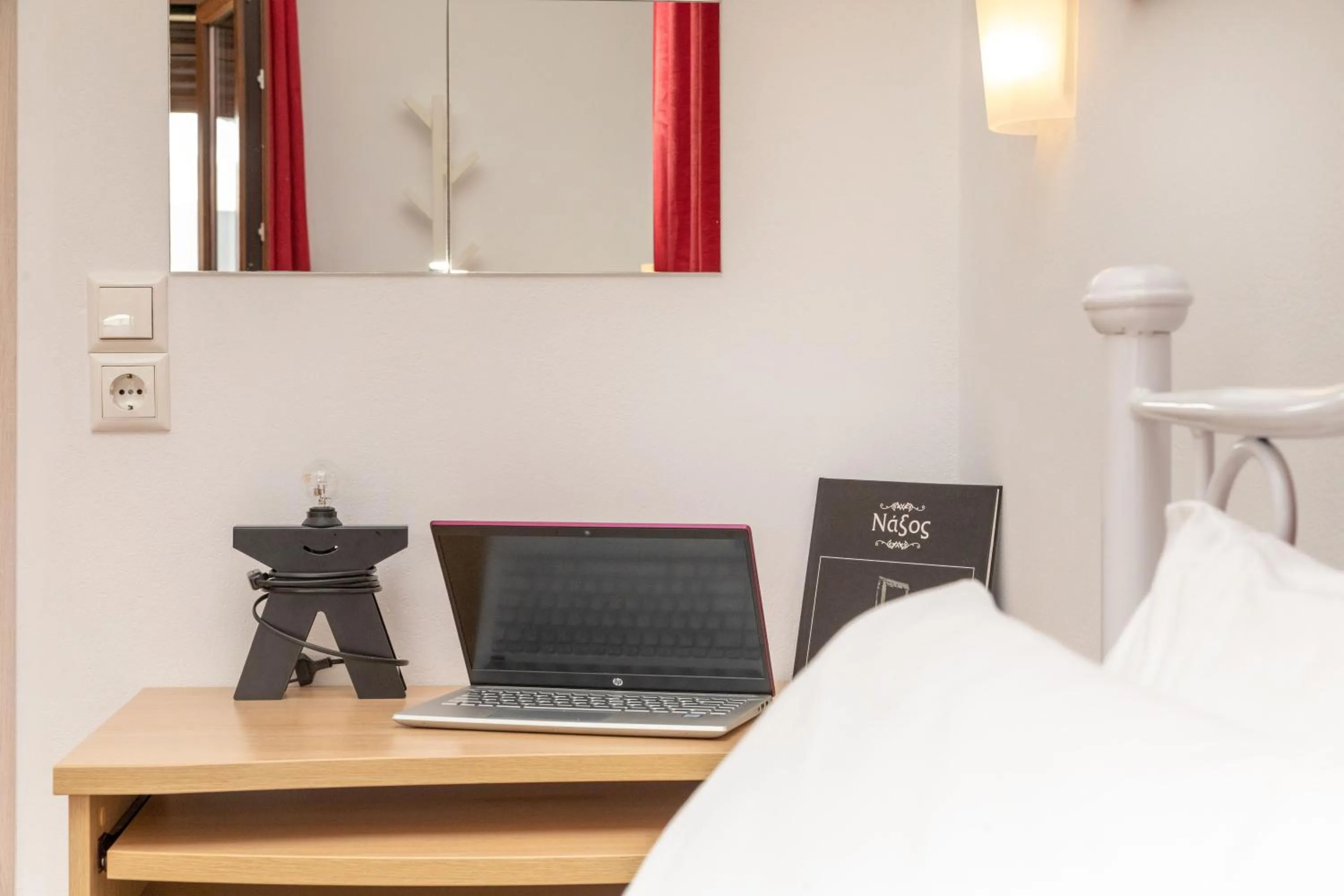 Bed in NAXOS DIAMOND Studios Apartments